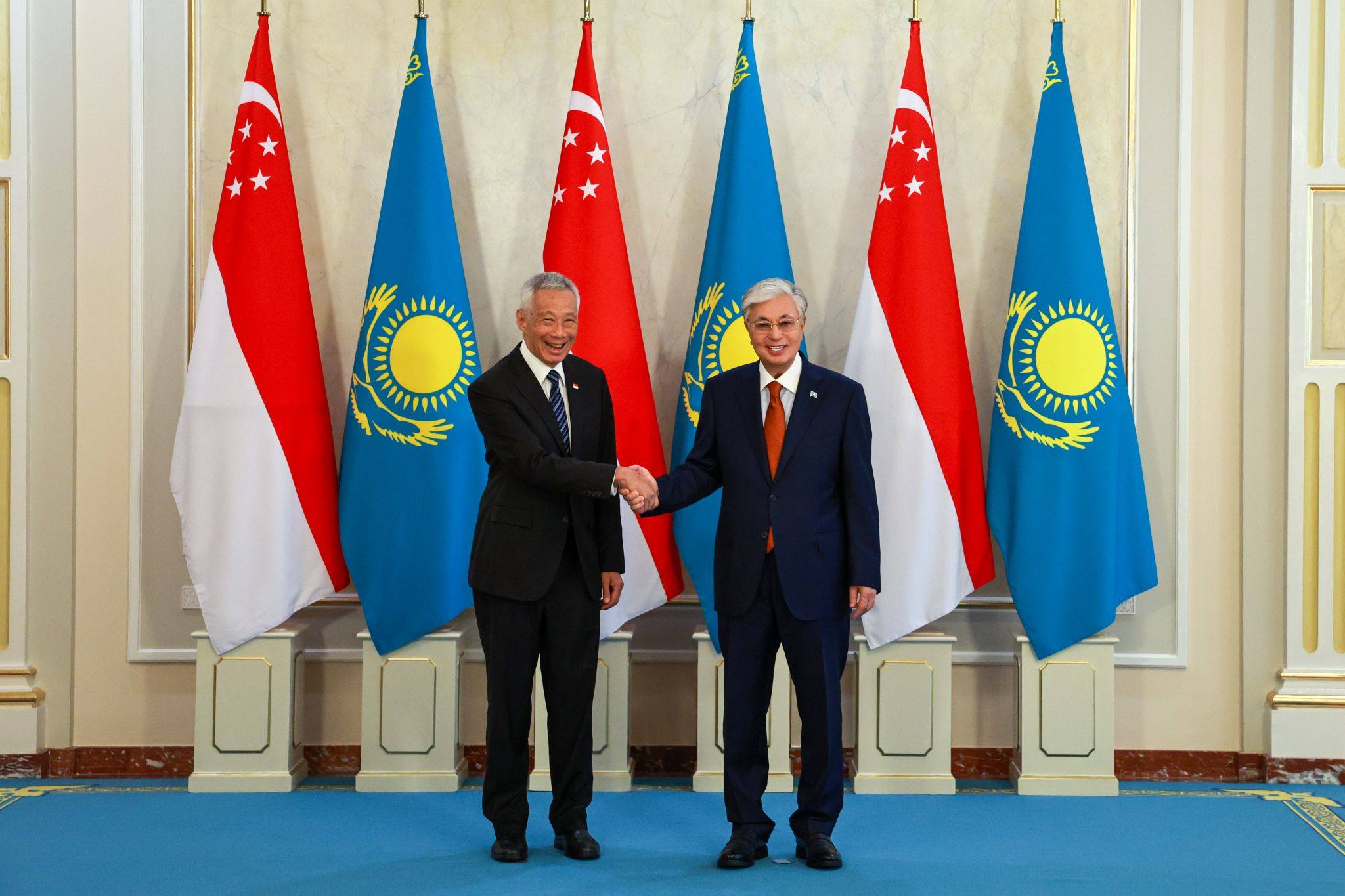 Singapore’s Senior Minister Lee Hsien Loong (left) and Kazakh President Kassym-Jomart Tokayev reaffirm the long-standing relations between both states last month. Photo: Ministry of Digital Development and Information