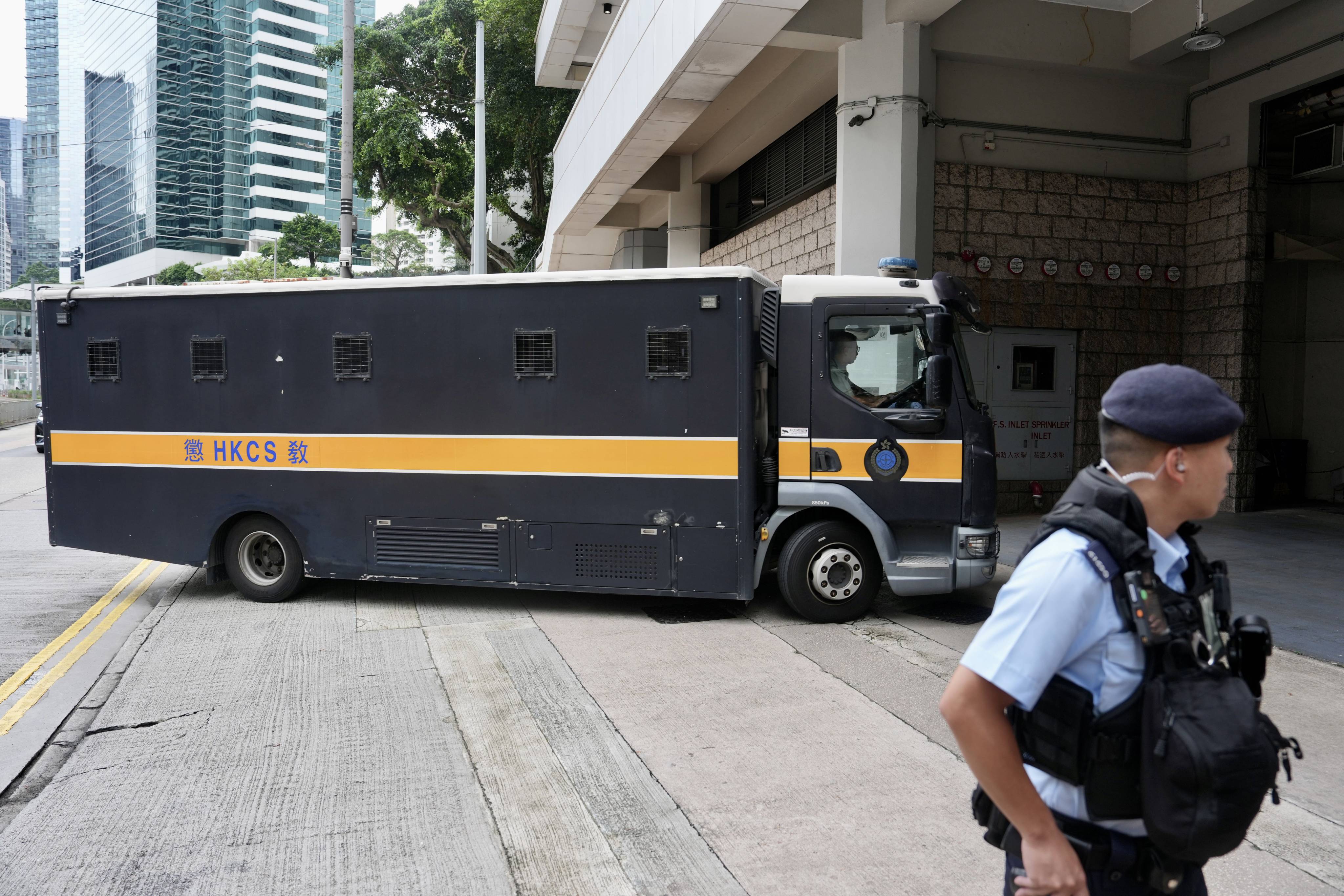 Wong arrives at the High Court in a correctional services vehicle on Wednesday. Photo: Sam Tsang