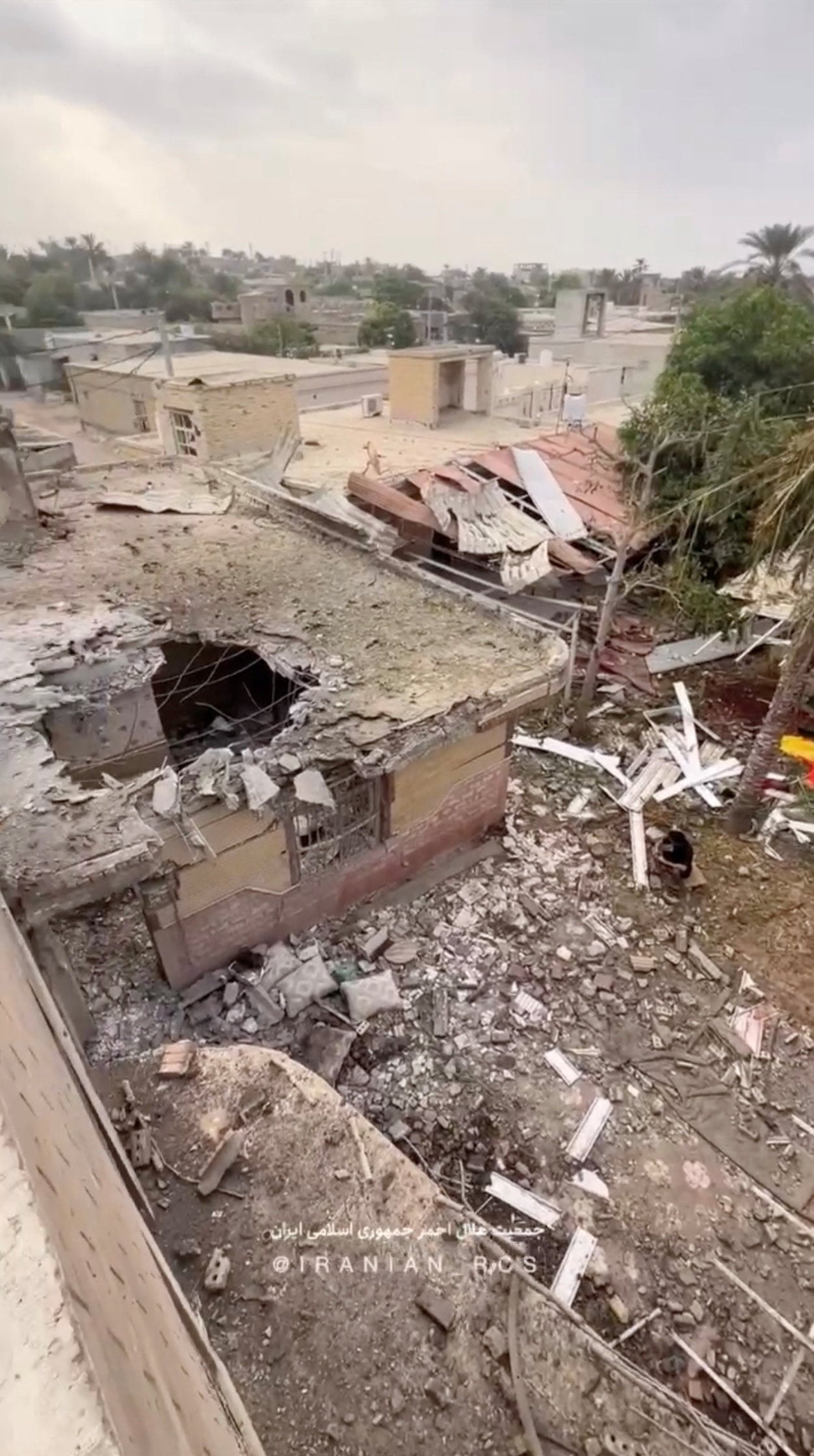 Rubble lies around damaged houses following a reported attack near a wedding gathering in Kuhistik, Sirik, Iran. Photo: Iranian Red Crescent Society via Reuters Rubble lies around damaged houses following a reported attack near a wedding gathering in Kuhistik, Sirik, Iran. Photo: Iranian Red Crescent Society via Reuters