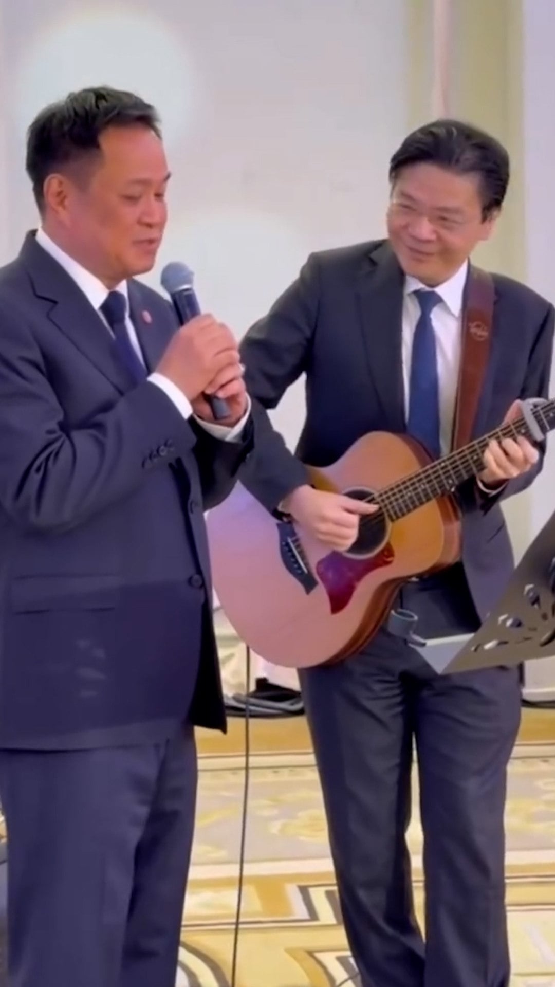 Thai Prime Minister Anutin Charnvirakul crooned the Beatles song “Let it Be” accompanied on guitar by visiting Singapore Prime Minister Lawrence Wong.
