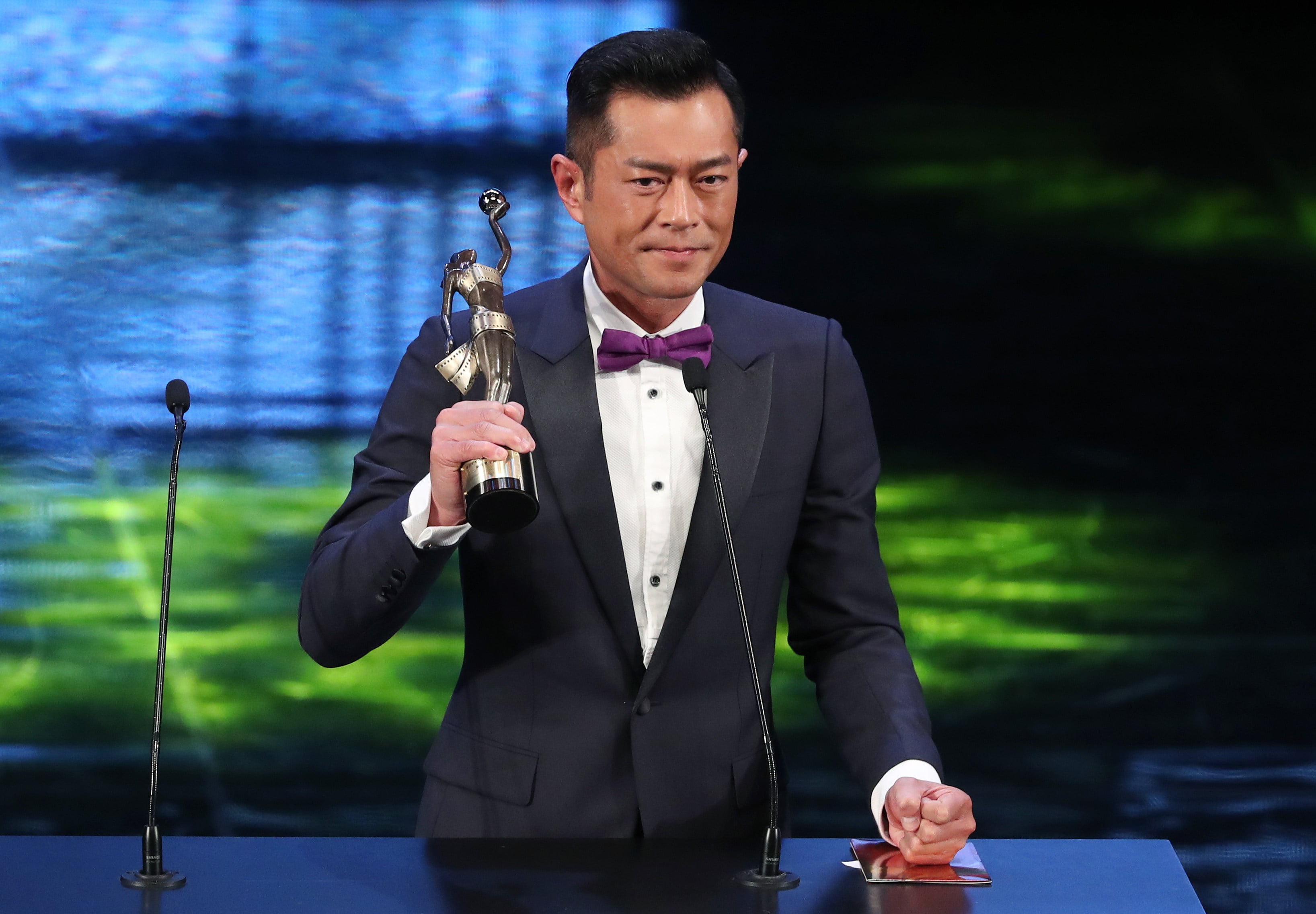 Hong Kong actor Louis Koo accepts the Best Actor trophy for his performance in Paradox at the 2018 Hong Kong Film Awards. Photo: K.Y. Cheng