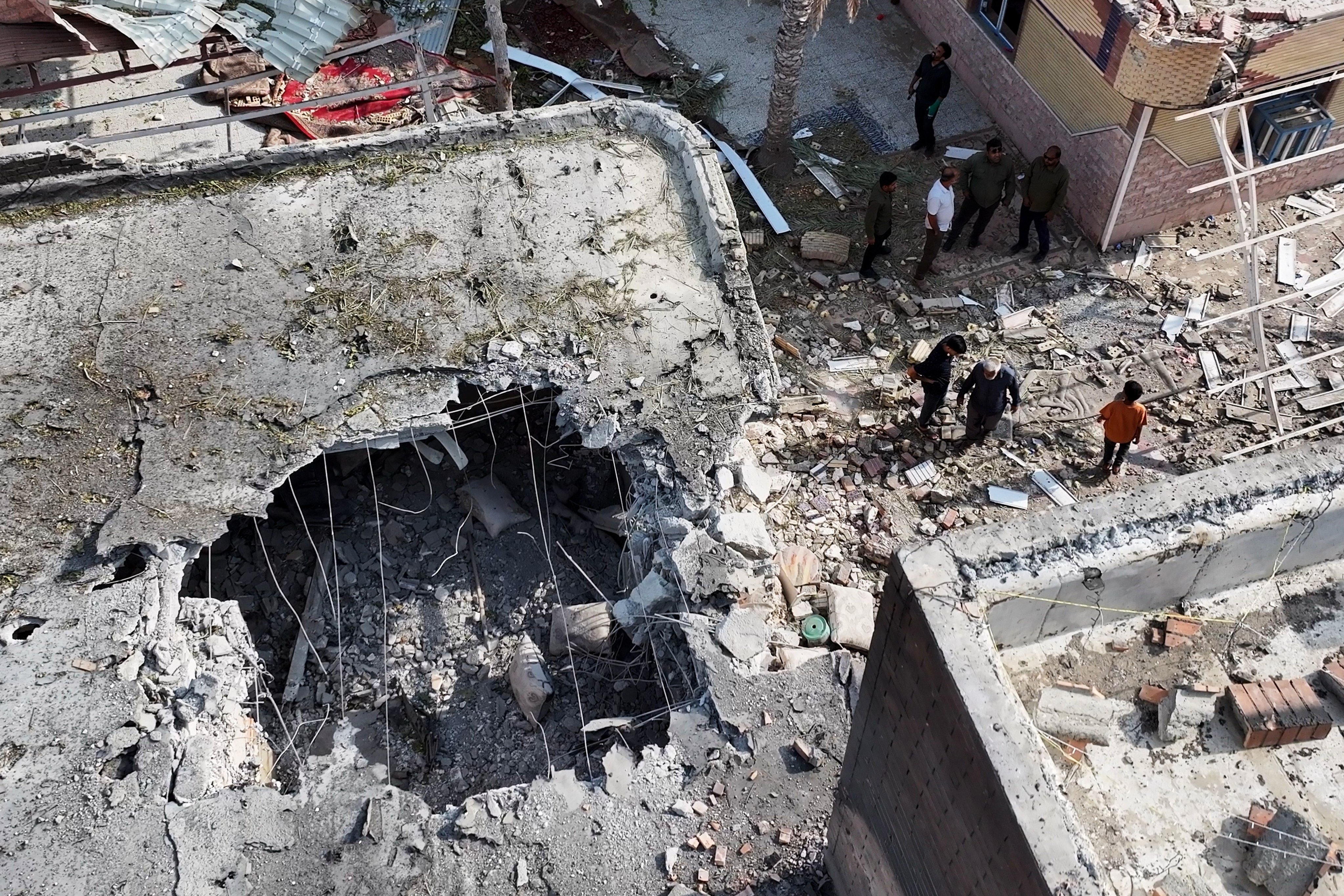 Damage and debris at a building that Iranian media said was hit by a US strike while a wedding celebration was taking place. Photo: Tasnim News Agency via AP