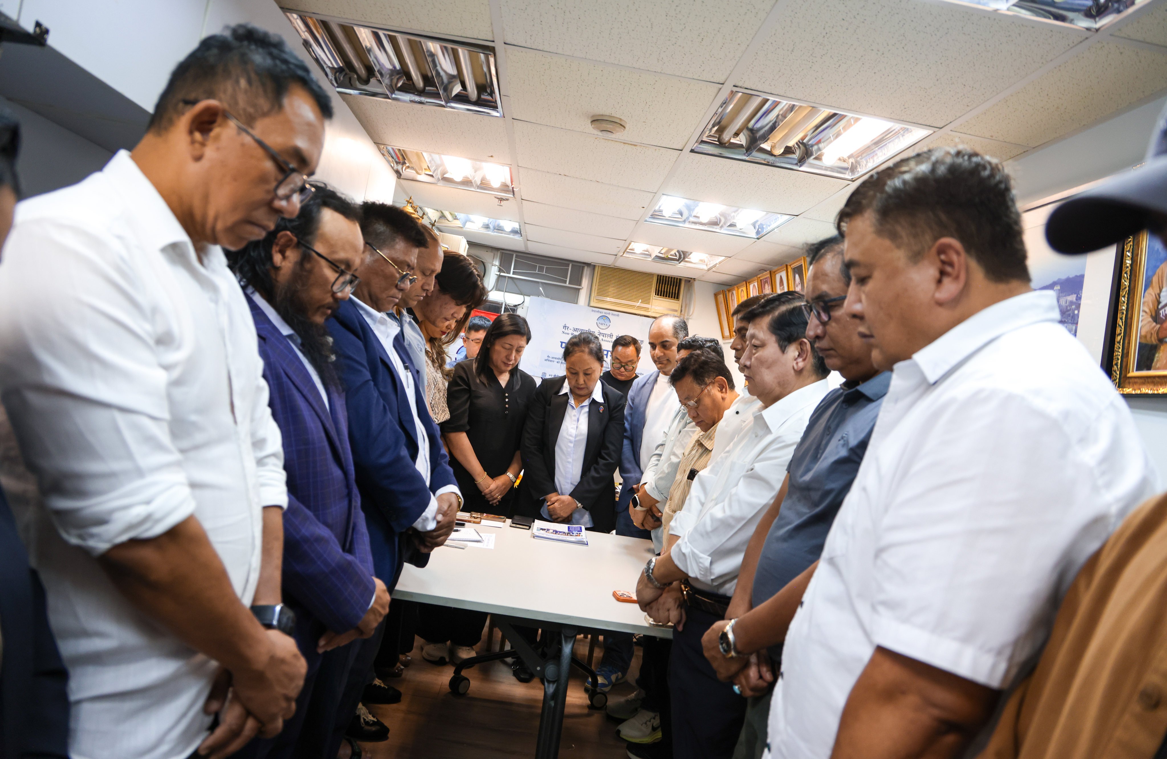 Victims of the disaster are mourned at the Non-Resident Nepalese Association office in Yau Ma Tei. Photo: Silvia Siu