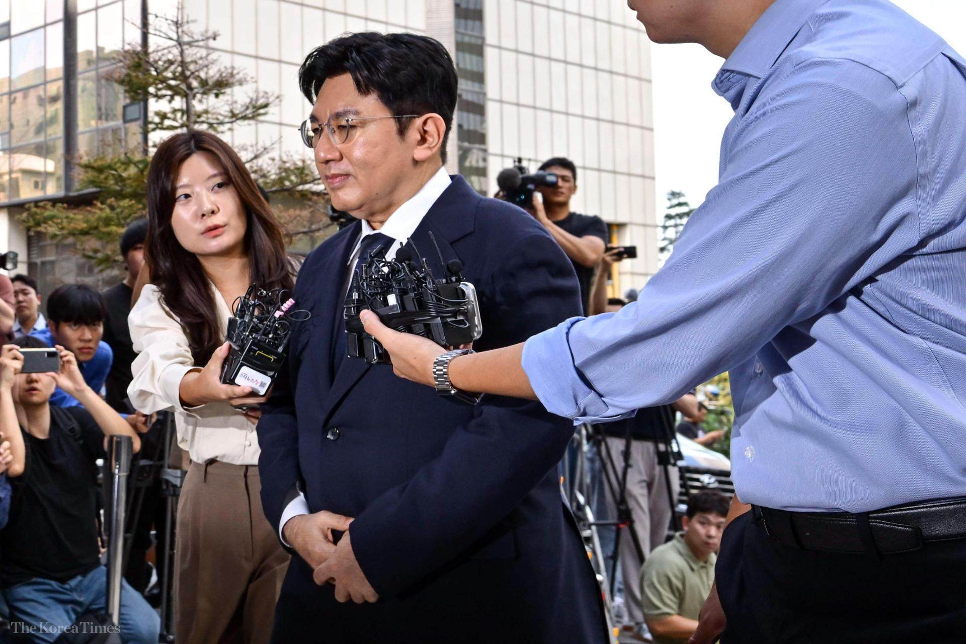 Hybe chairman Bang Si-hyuk appears at the Seoul Metropolitan Police Agency’s financial crime investigation unit in Seoul in September last year for questioning over alleged violations of the Capital Markets Act. Photo: Korea Times