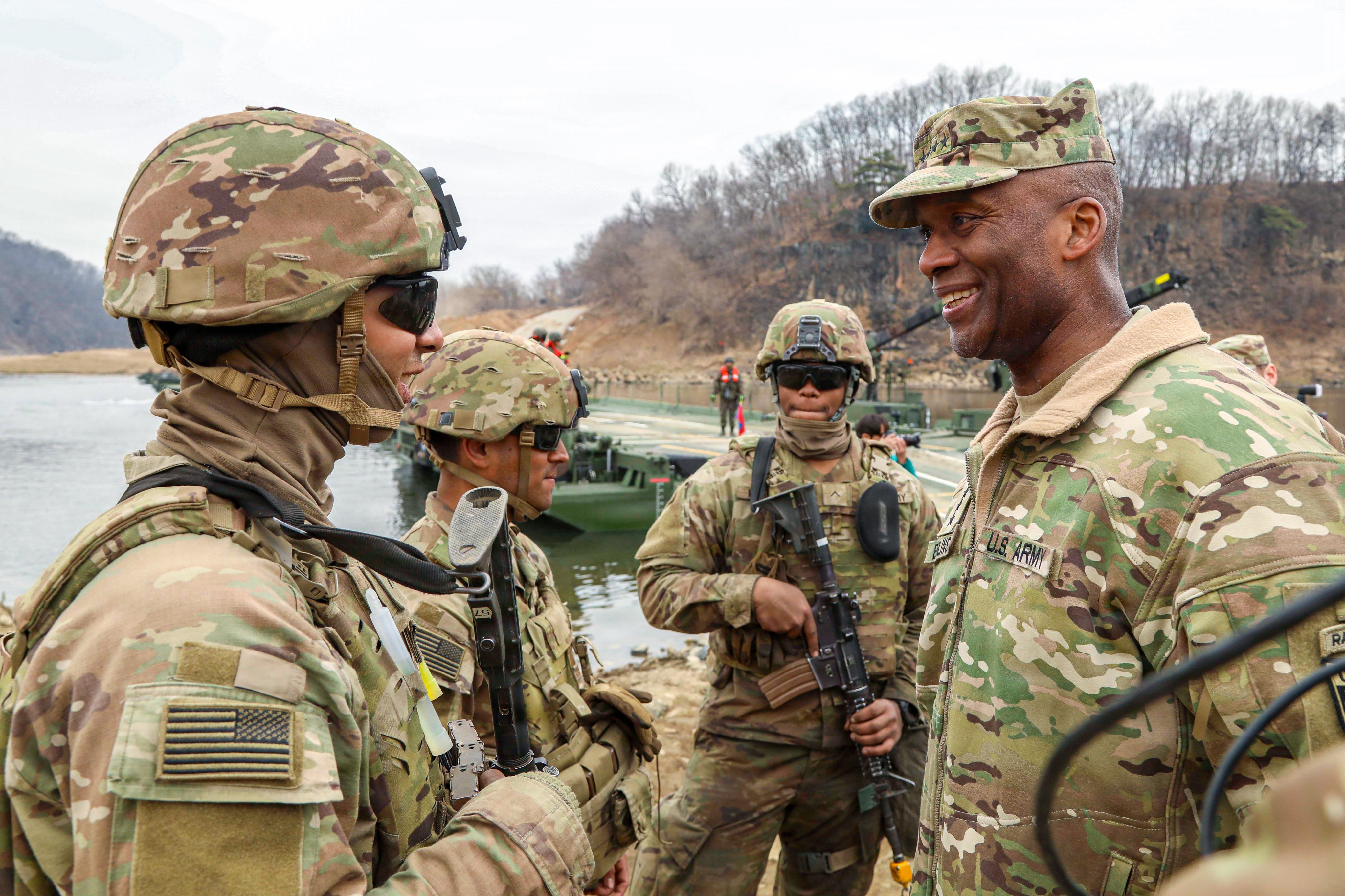 USFK Commander Xavier Brunson (right) interacts with US soldiers during a Freedom Shield exercise near Yeoncheon, South Korea, on March 14. Photo: US Forces Korea