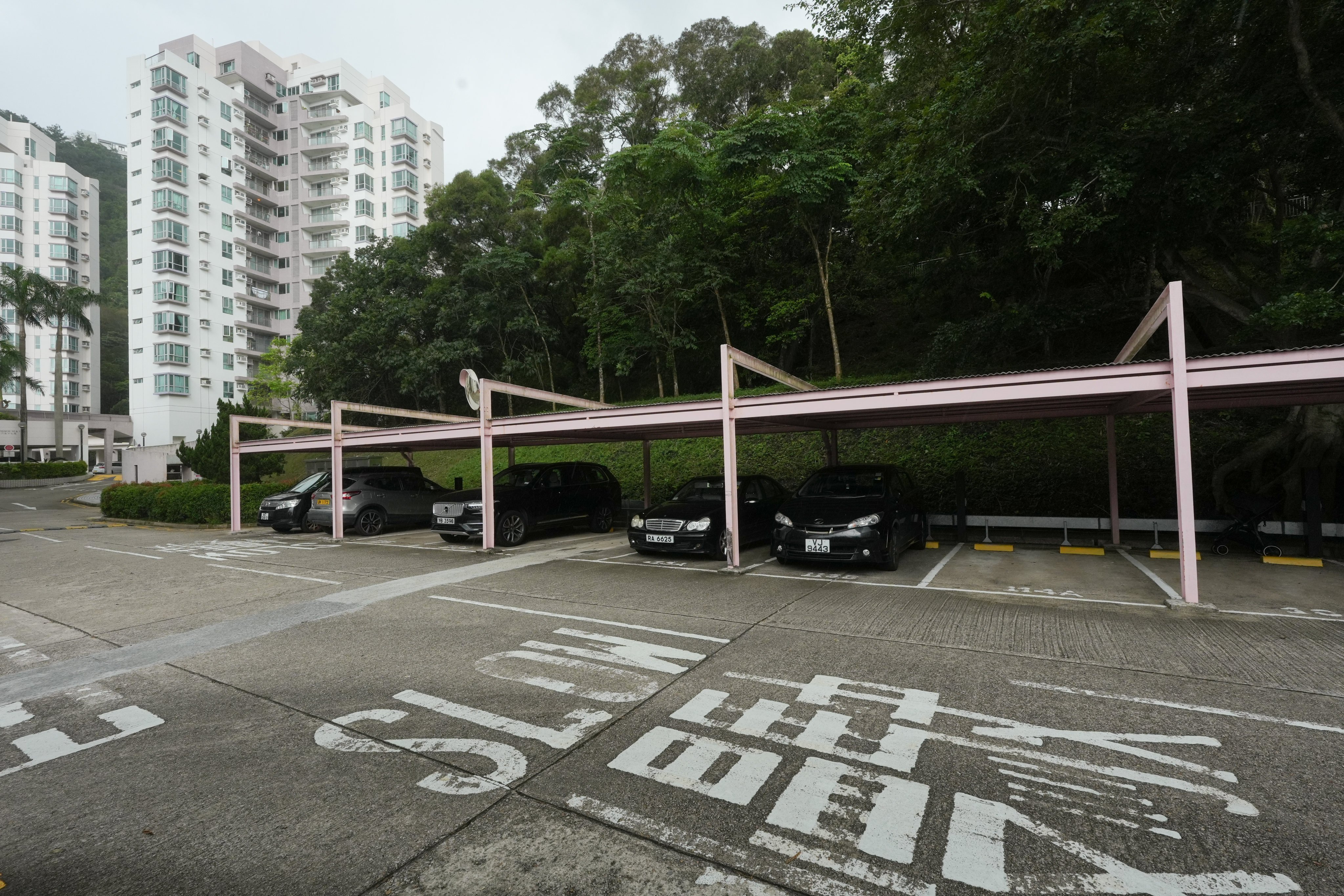 The parking lots outside the staff residence building where Wong parked his car after crashing into two other stationery vehicles in July. Photo: Sun Yeung