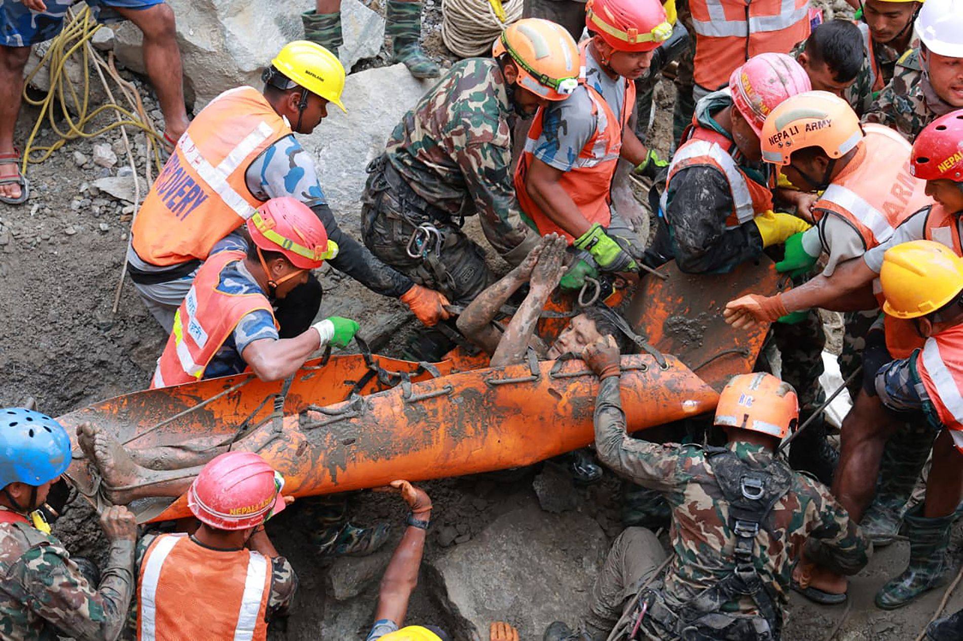 Army personnel carrying a worker who was trapped inside a tunnel during a rescue operation at Trishuli 3A hydropower project in Nepal’s Rasuwa district on Friday. Photo: Nepal army/AFP