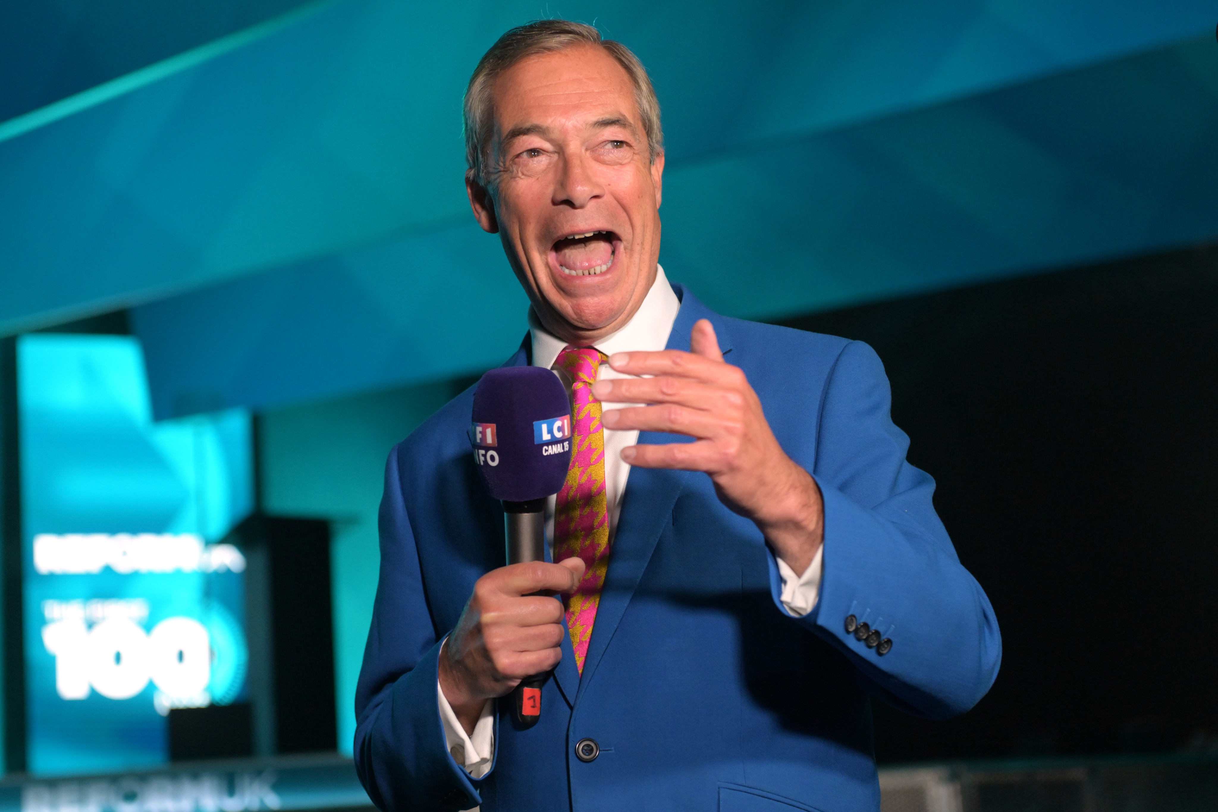 Reform UK leader Nigel Farage speaks to the media during the party’s annual conference in Birmingham on Friday. Photo: AP