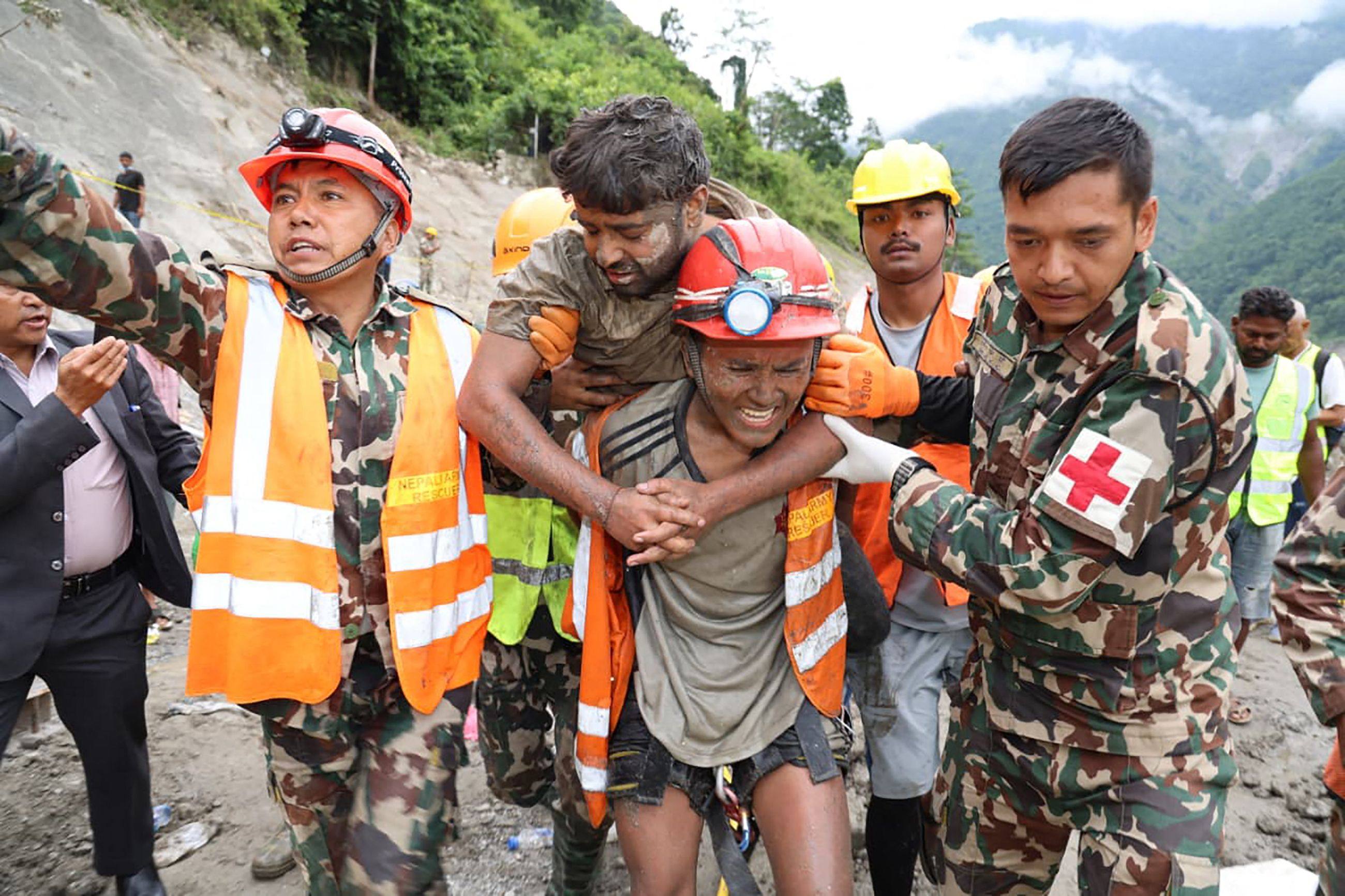 Army personnel carrying a worker who was trapped inside a tunnel during a rescue operation at Trishuli 3A hydropower project in Nepal’s Rasuwa district on Friday. Photo: Nepal army/AFP