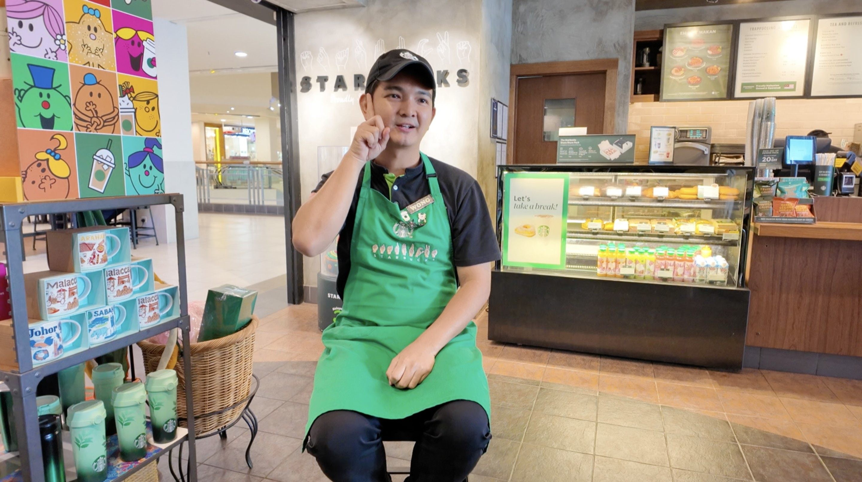 Wong Yi Xiang, a deaf Starbucks employee, says he wants a fair chance to show his work-related skills. Photo: Ushar Daniele