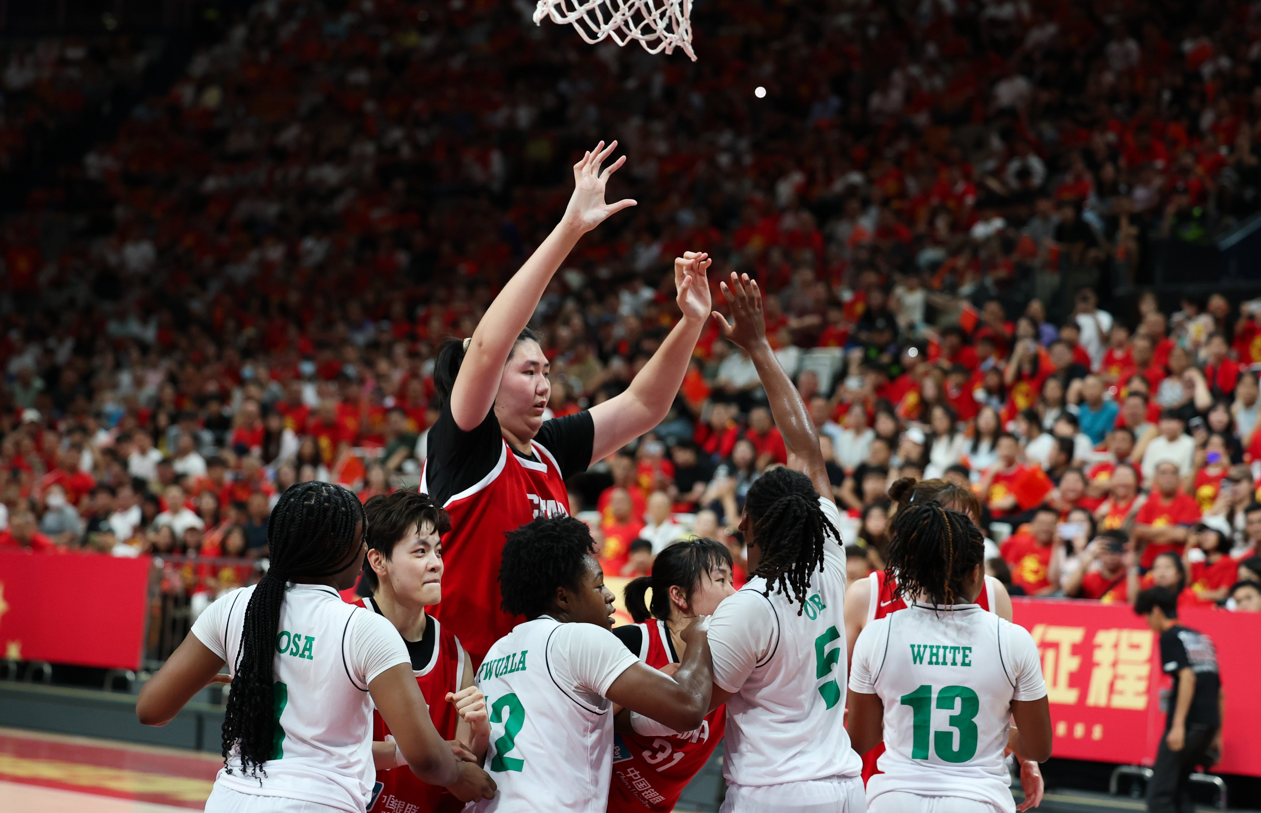 Teams at the World Cup will have to navigate around and over some of the tallest women on the planet, including China’s 19-year-old Zhang Ziyu. Photo: Xinhua