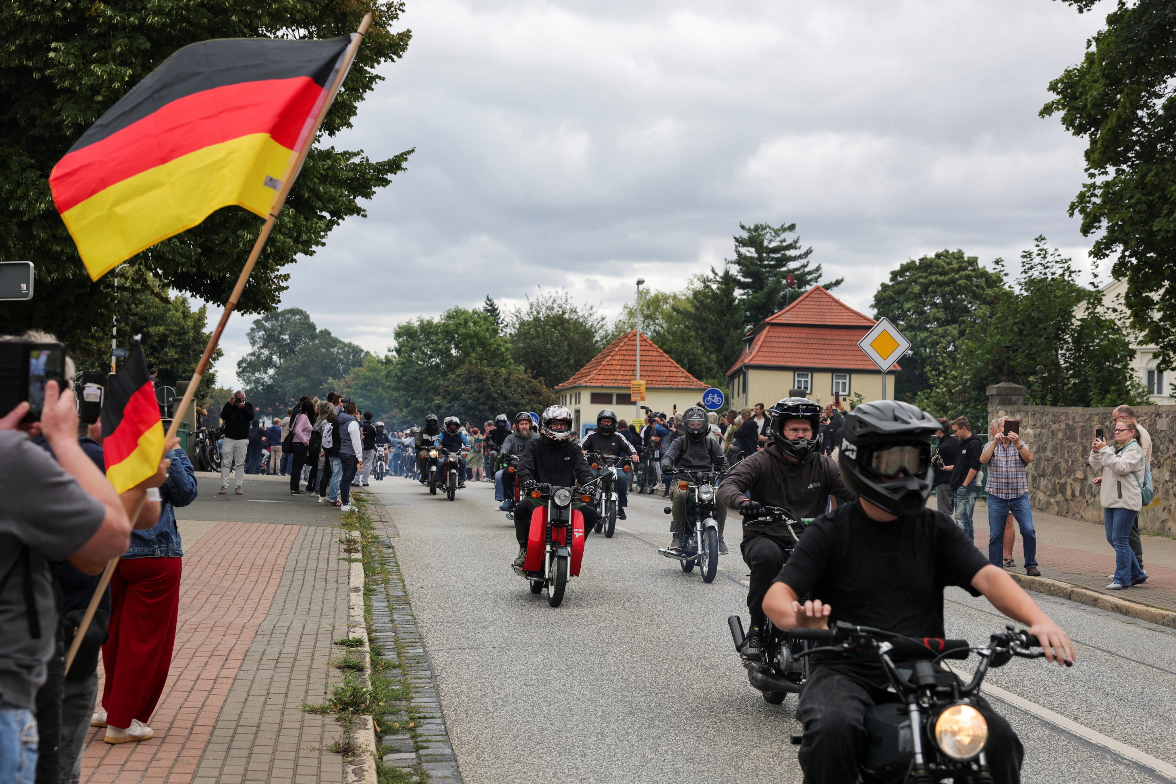 People take part in a motorcycle ride in the Saxony-Anhalt state election, where the AfD is looking to draw support from strong feelings of identification with former East Germany among voters in Quedlinburg, in August. Photo: Reuters