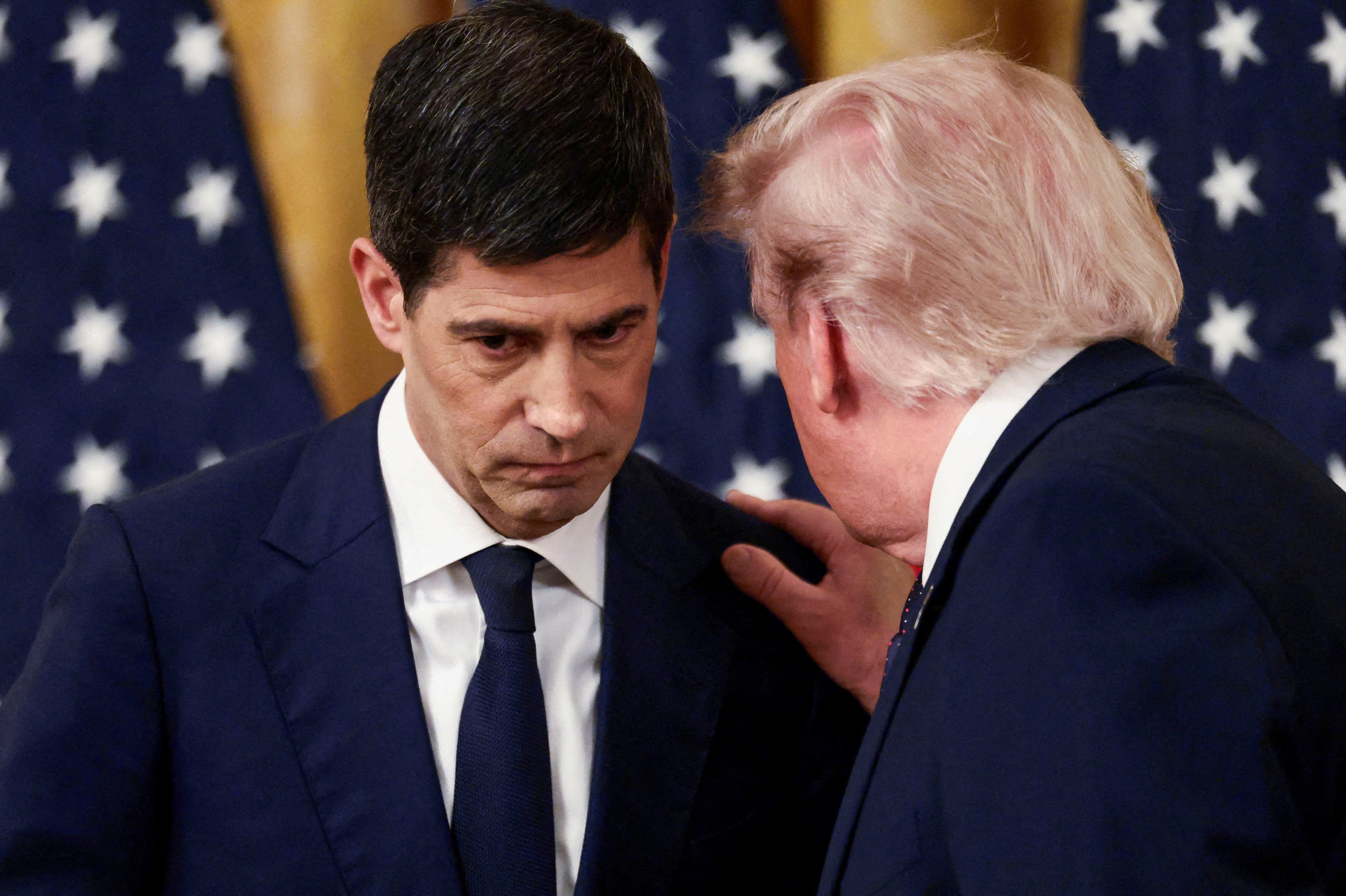 US President Donald Trump speaks with the new Federal Reserve Chair Kevin Warsh on the day of his swearing-in ceremony at the White House in May. Photo: Reuters