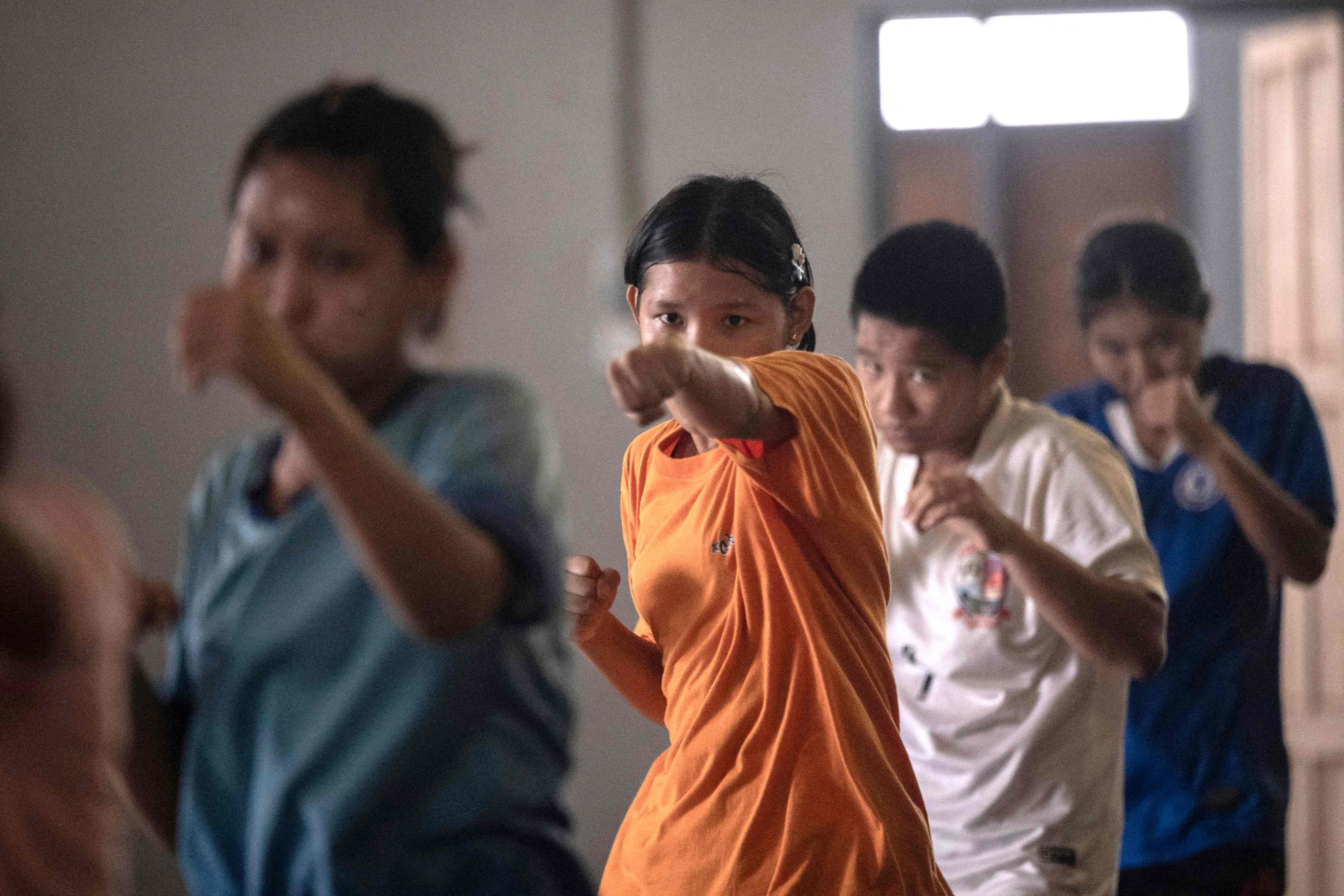 Young lethwei fighters training in Hpa-an in Myanmar’s Kayin state in May. Photo: AFP