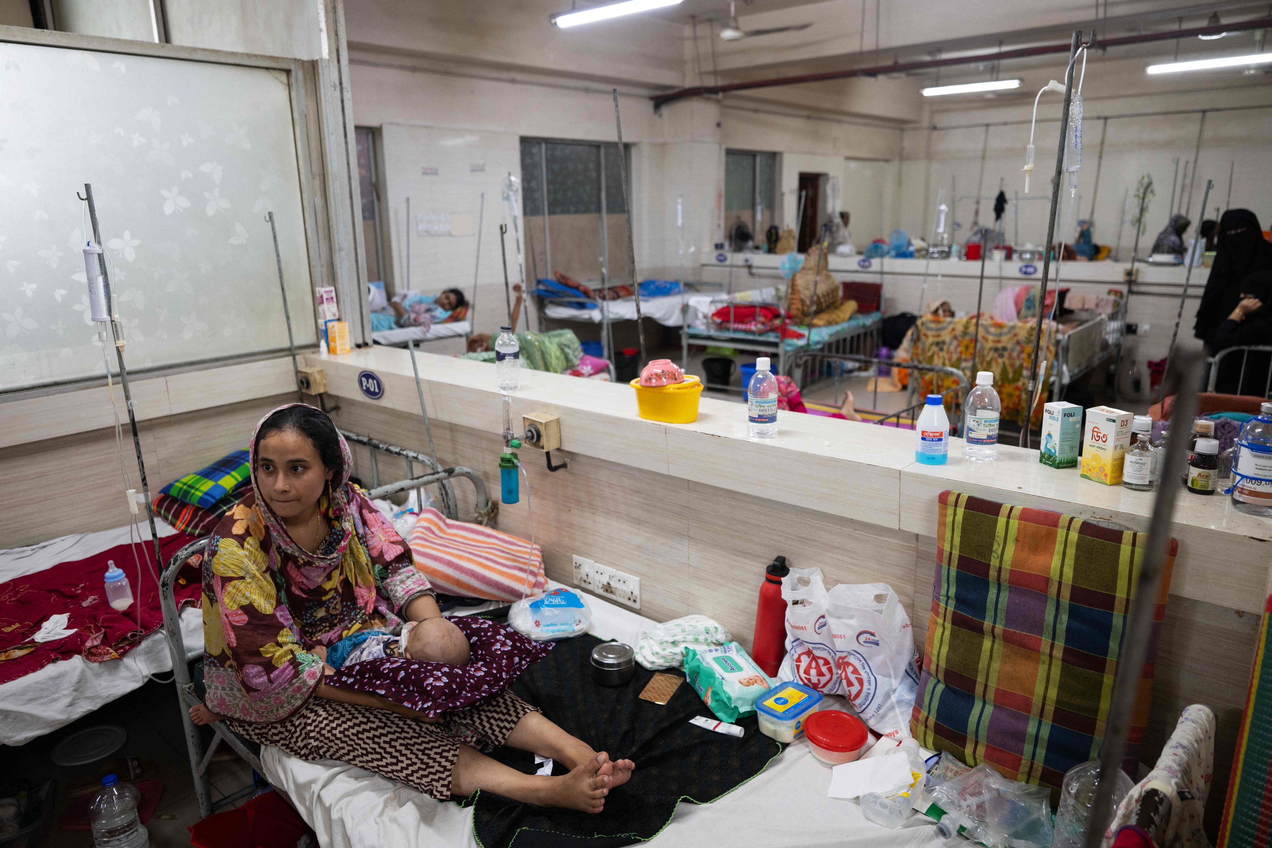 Children receive treatment for measles in Dhaka on Thursday. Photo: AFP
