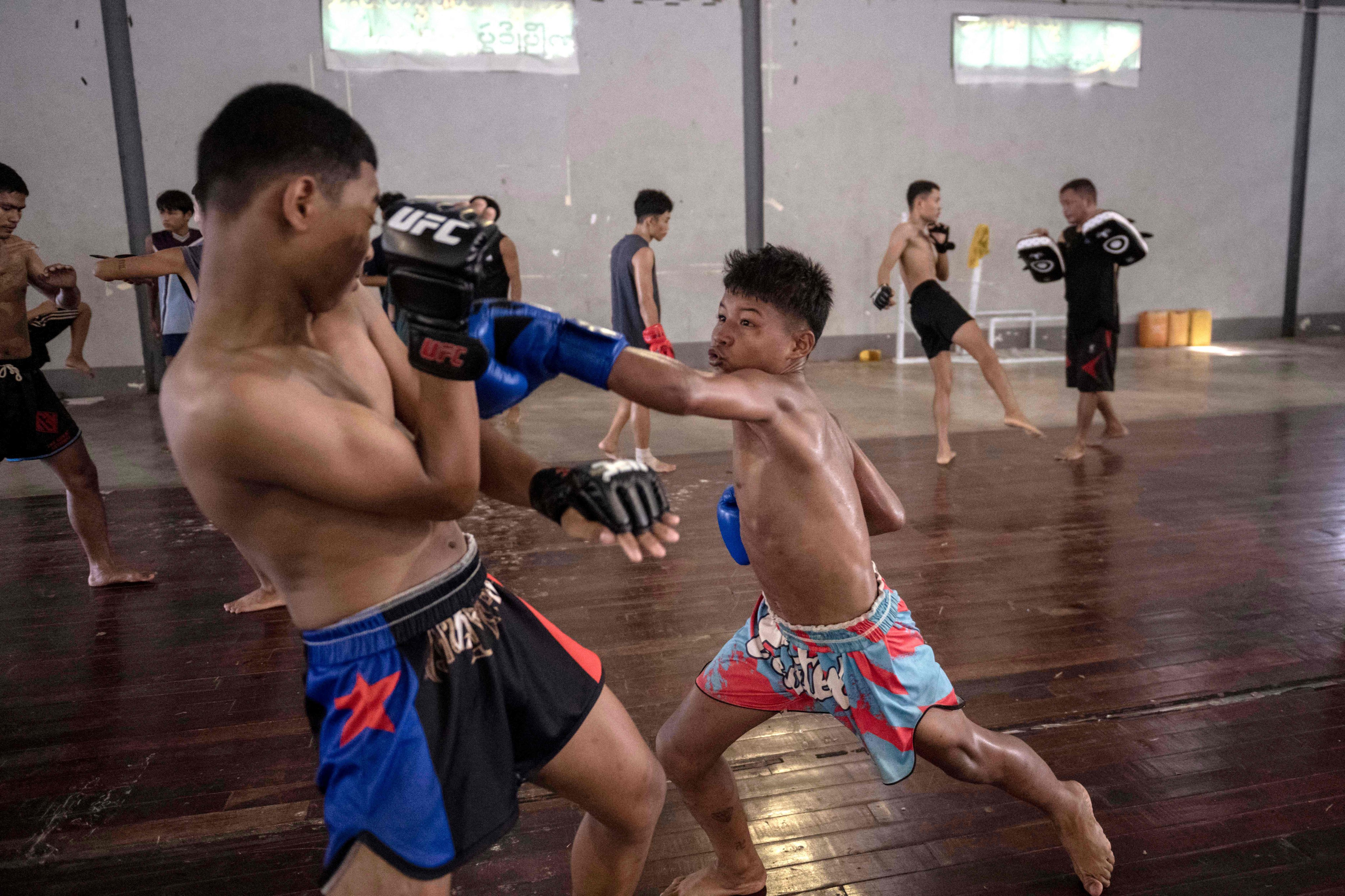 Fighters training in traditional Myanmar boxing known as lethwei in Hpa-an in Myanmar’s Kayin state in May. Photo: AFP