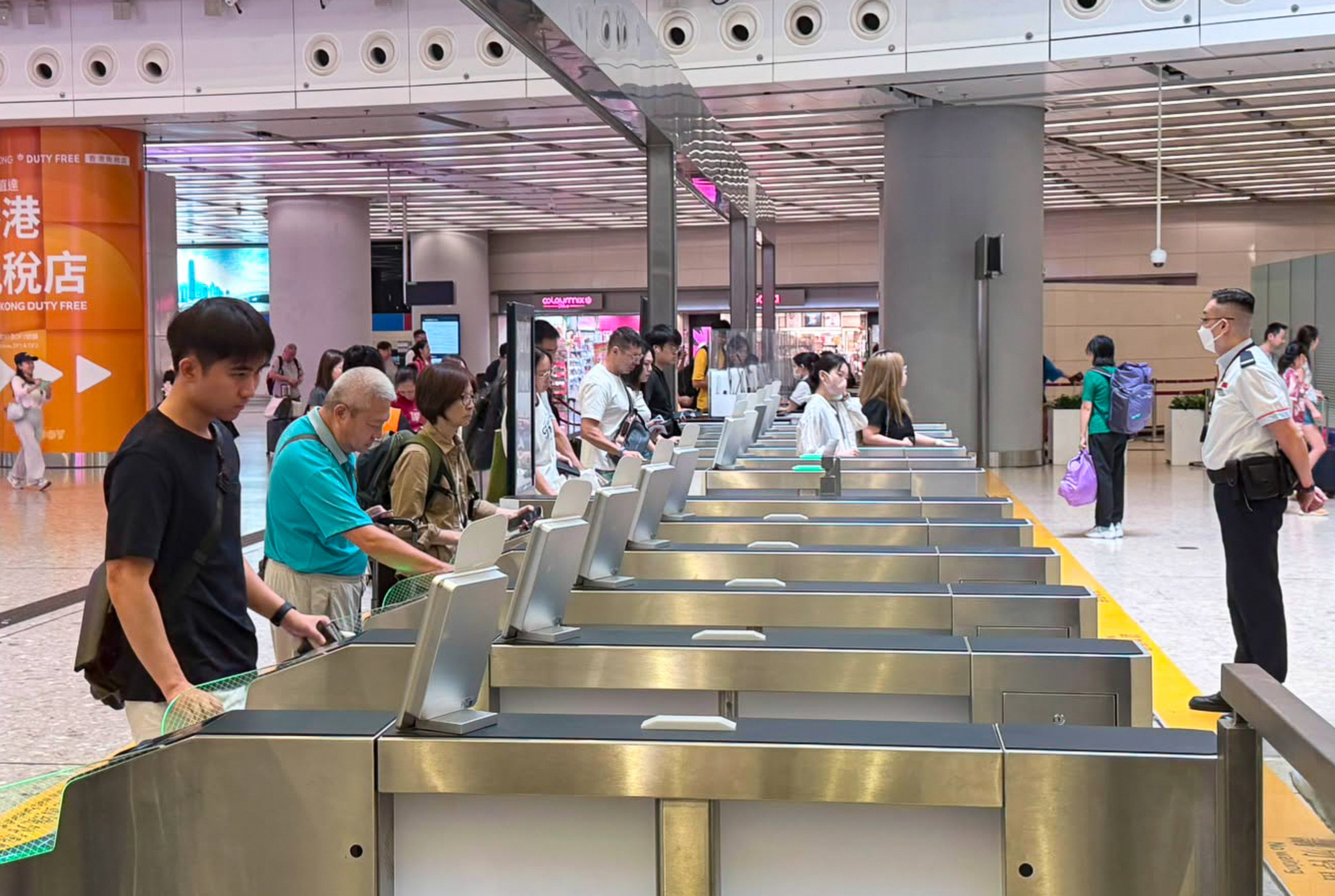Passengers enter gantries for Hong Kong’s high-speed rail services. Photo: Eric Jiang