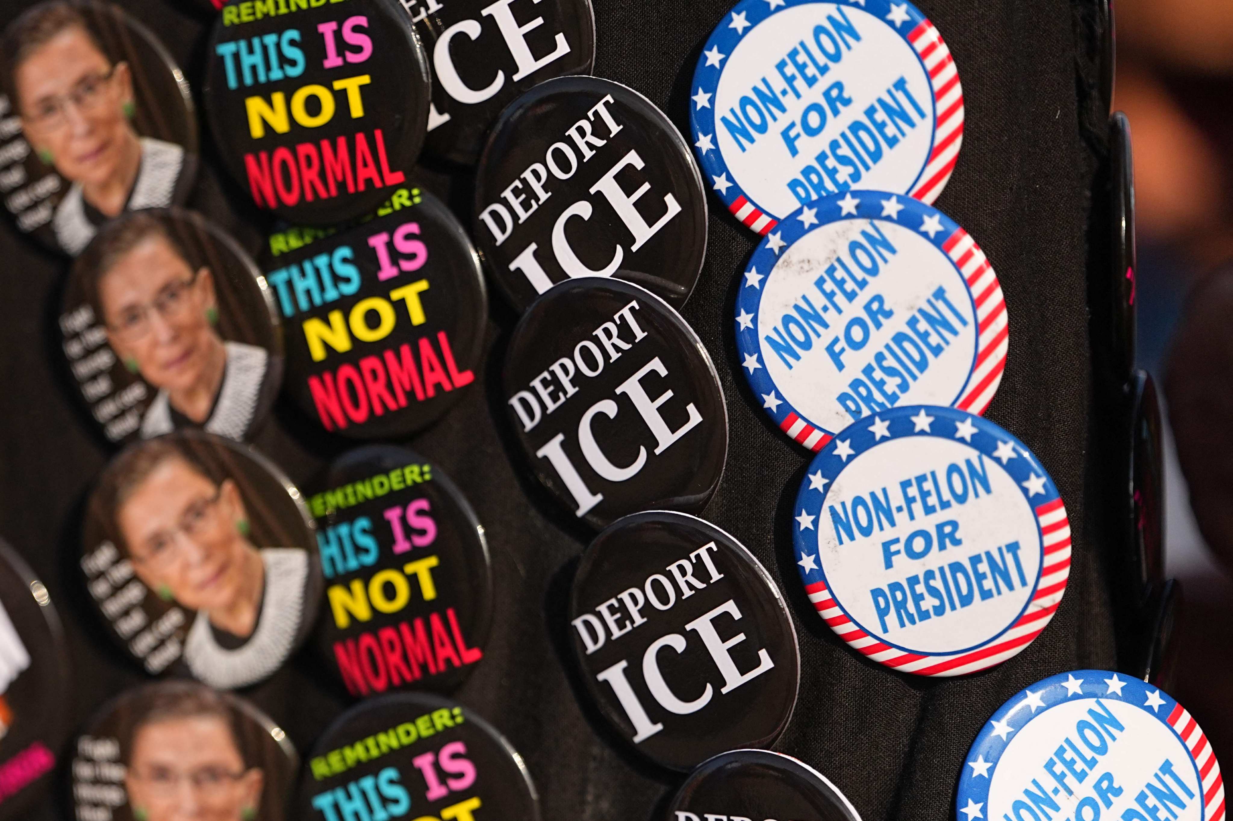 Pins reading “Deport ICE” are seen during a rally at the Lincoln Memorial in Washington DC last month. Photo: AFP