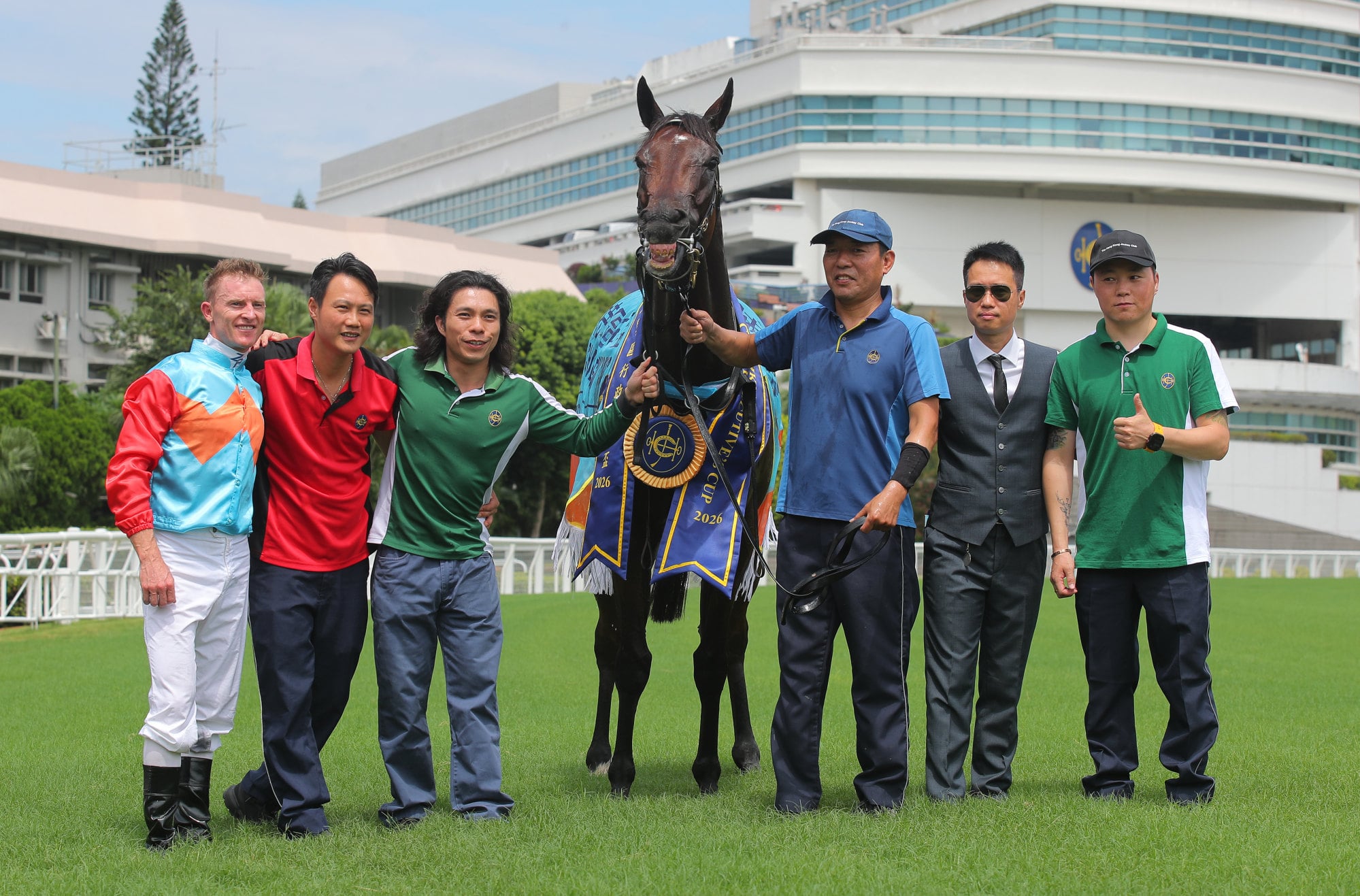 David Hayes’ team celebrates the win of Ka Ying Rising. David Hayes’ team celebrates the win of Ka Ying Rising.