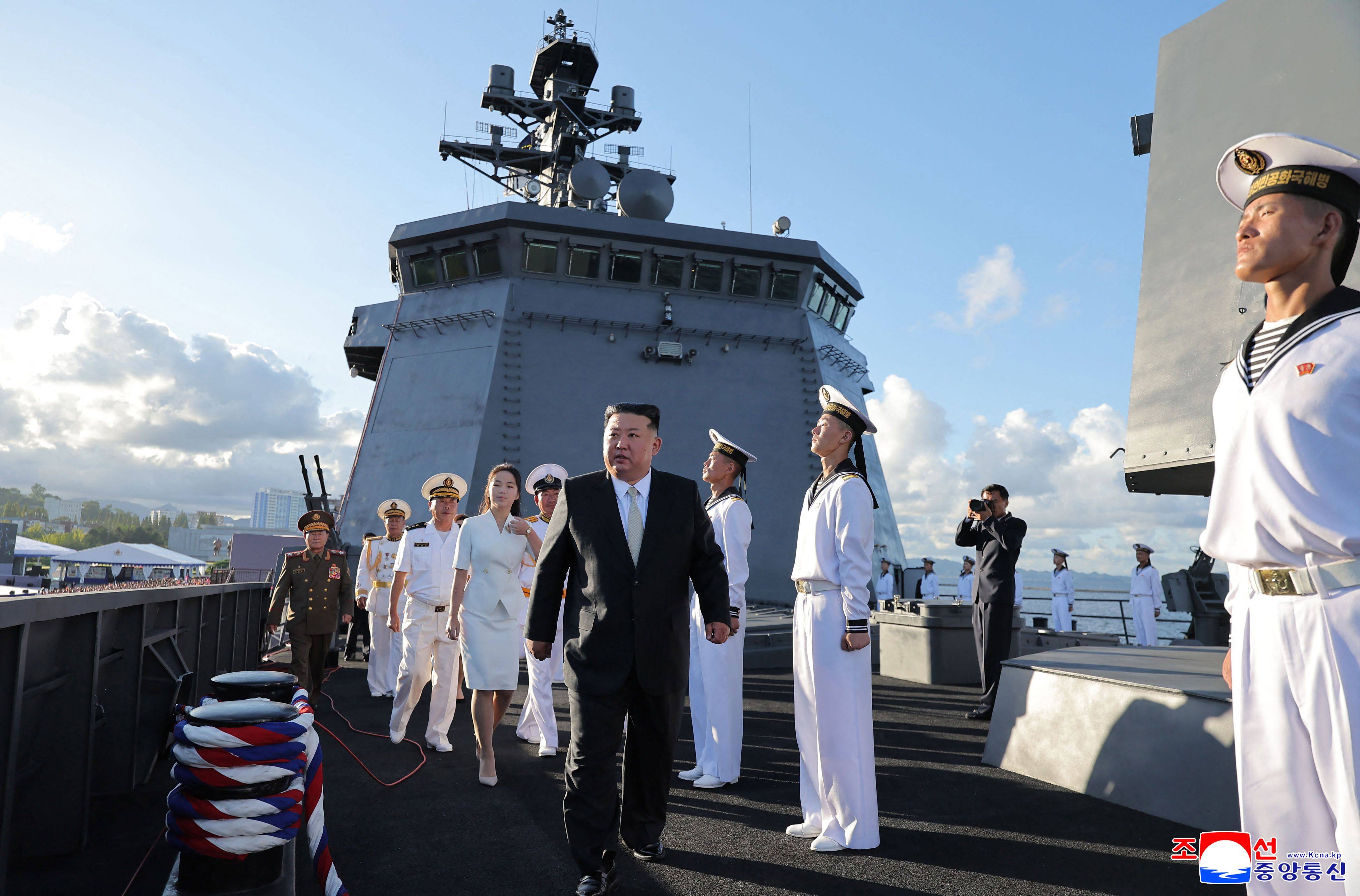 North Korean leader Kim Jong-un tours the Kang Kon with his daughter, Jue-ae at Wonsan Port on Sunday. Photo: KCNA / AFP