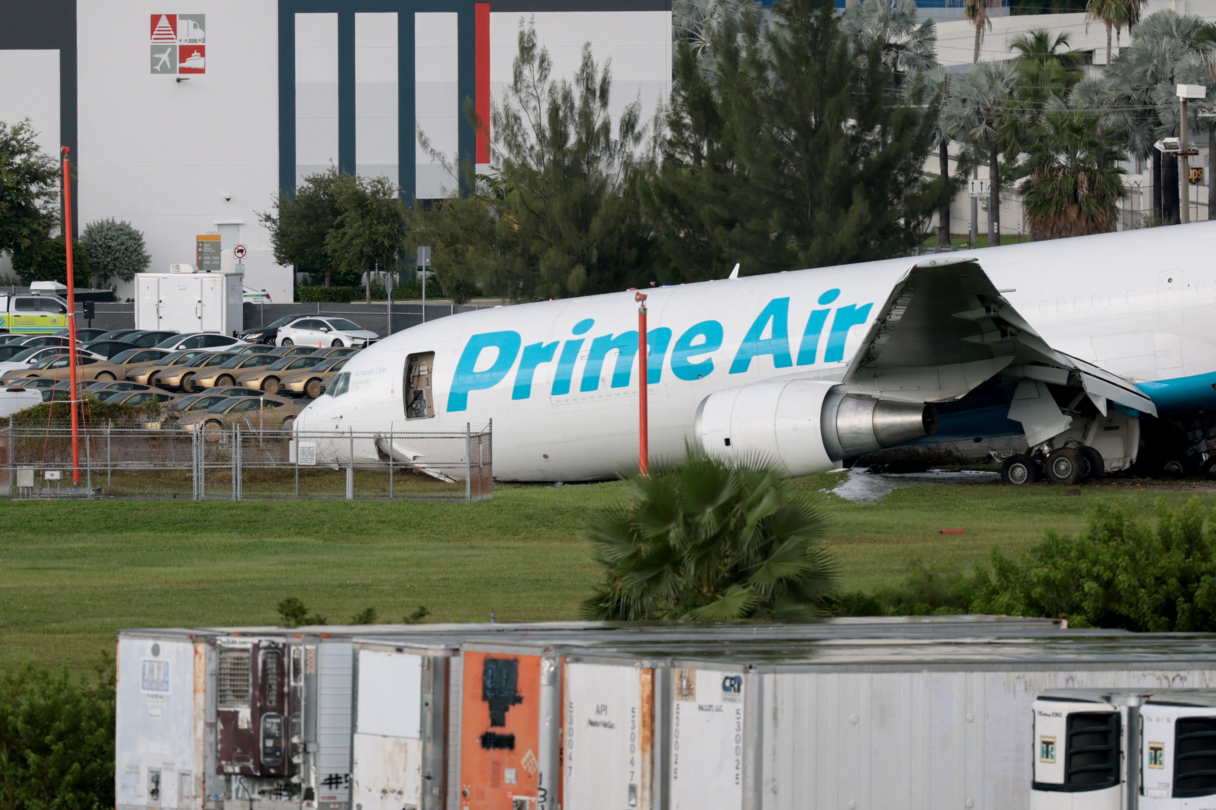 MIAMI, FLORIDA - SEPTEMBER 06: An Amazon cargo plane is seen after it crashed at Miami International Airport on September 06, 2026 in Miami, Florida. In a statement, the Federal Aviation Administration said Prime Air Flight 7598 overran the runway while landing around 2 p.m. after departing from Luis Muñoz Marín International Airport in San Juan, Puerto Rico, earlier today.   Joe Raedle/Getty Images/AFP (Photo by JOE RAEDLE / GETTY IMAGES NORTH AMERICA / Getty Images via AFP)