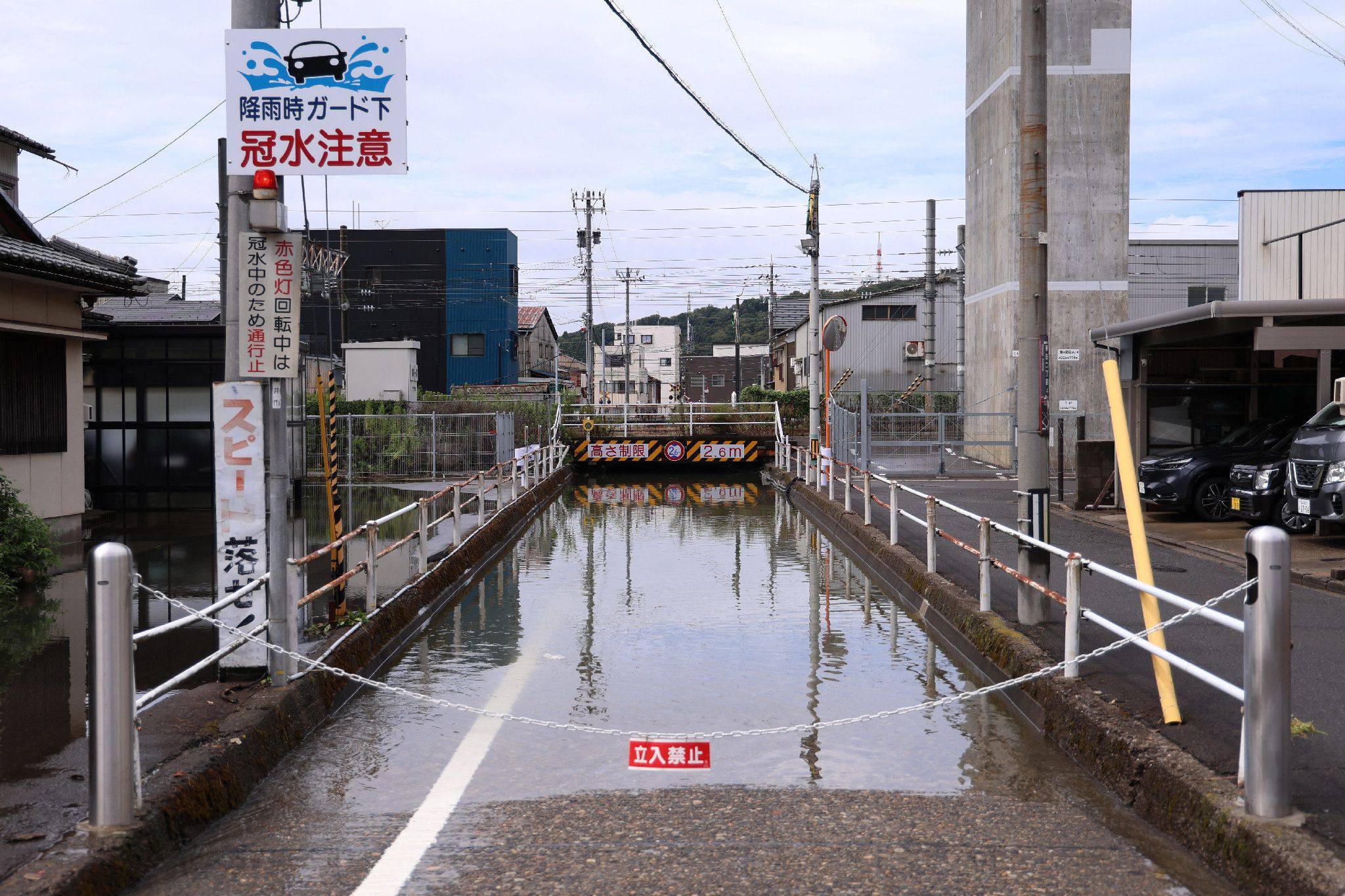 An underpass is flooded after heavy rains in Fukui, central Japan, on August 30. Photo: Jiji Press / AFP