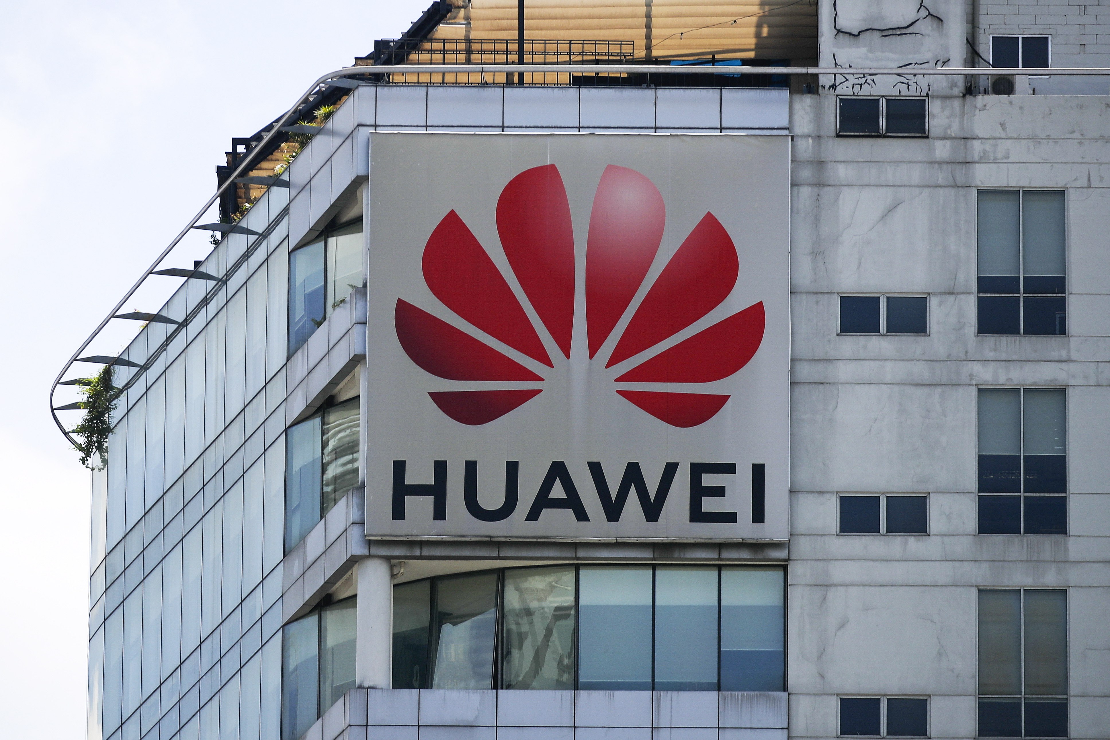 The logo of Huawei Technologies is seen on the facade of a building in Kuala Lumpur, Malaysia. Photo: EPA-EFE