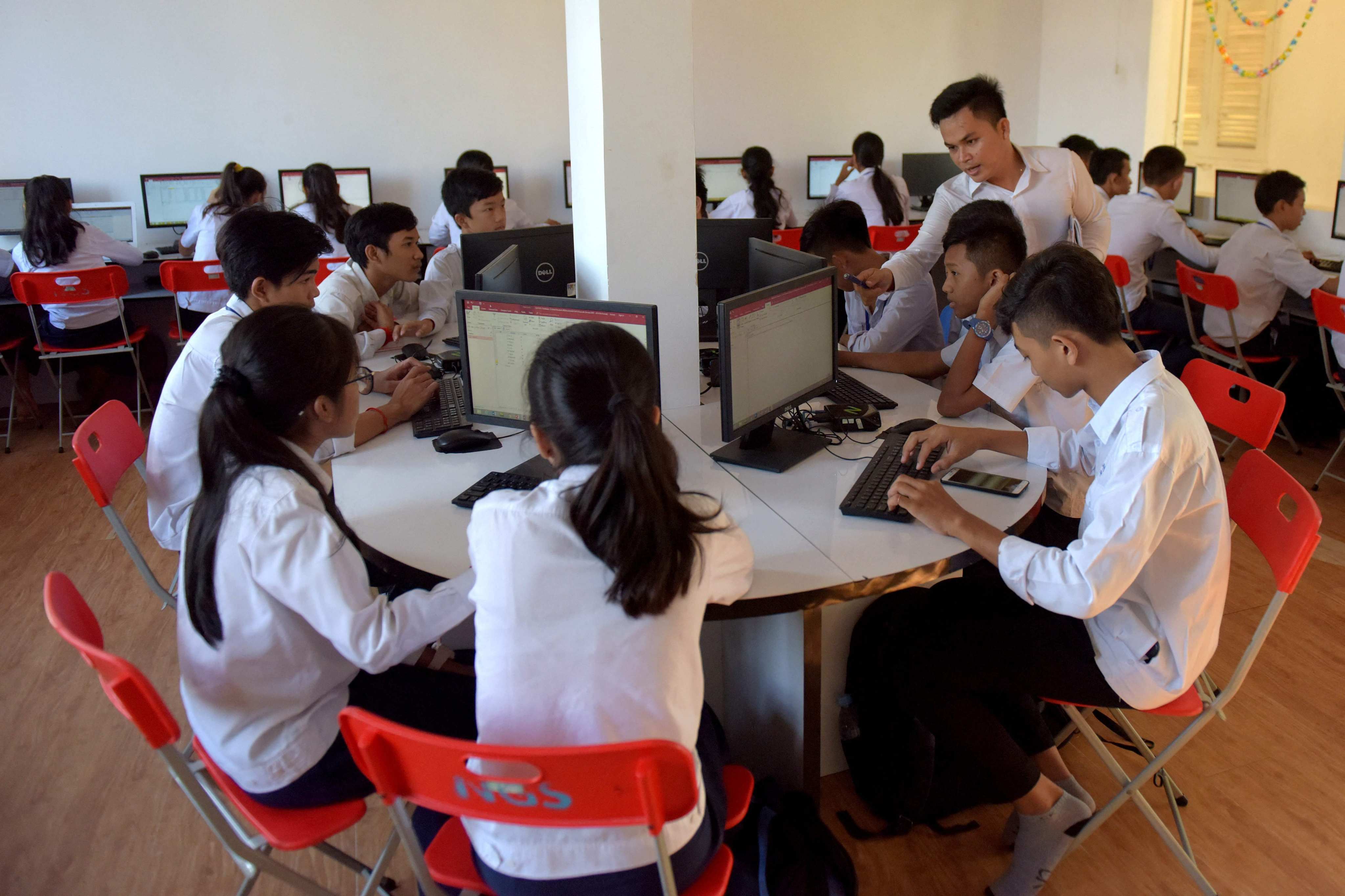 Cambodian students use a computer room at a school in 2018. The latest MOU builds on an agreement signed last year to roll out the CoolThink@JC programme in the country’s primary schools. Photo: AFP
