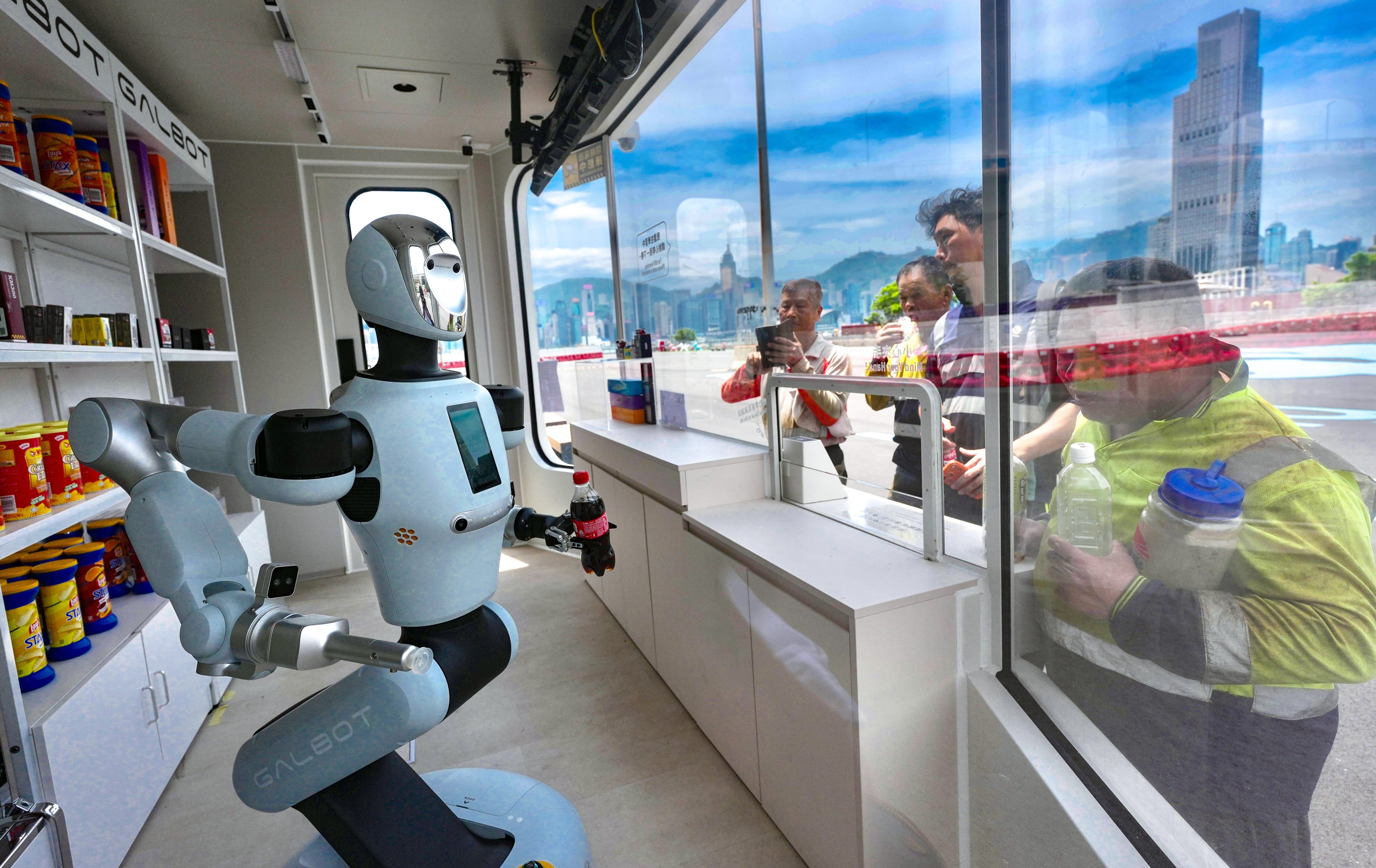 A Galbot robot serves customers at a new store in Hung Hom. Hong Kong aims to "strengthen its strategic positioning as an international innovation and technology centre", a government spokesman said. Photo: Karma Lo