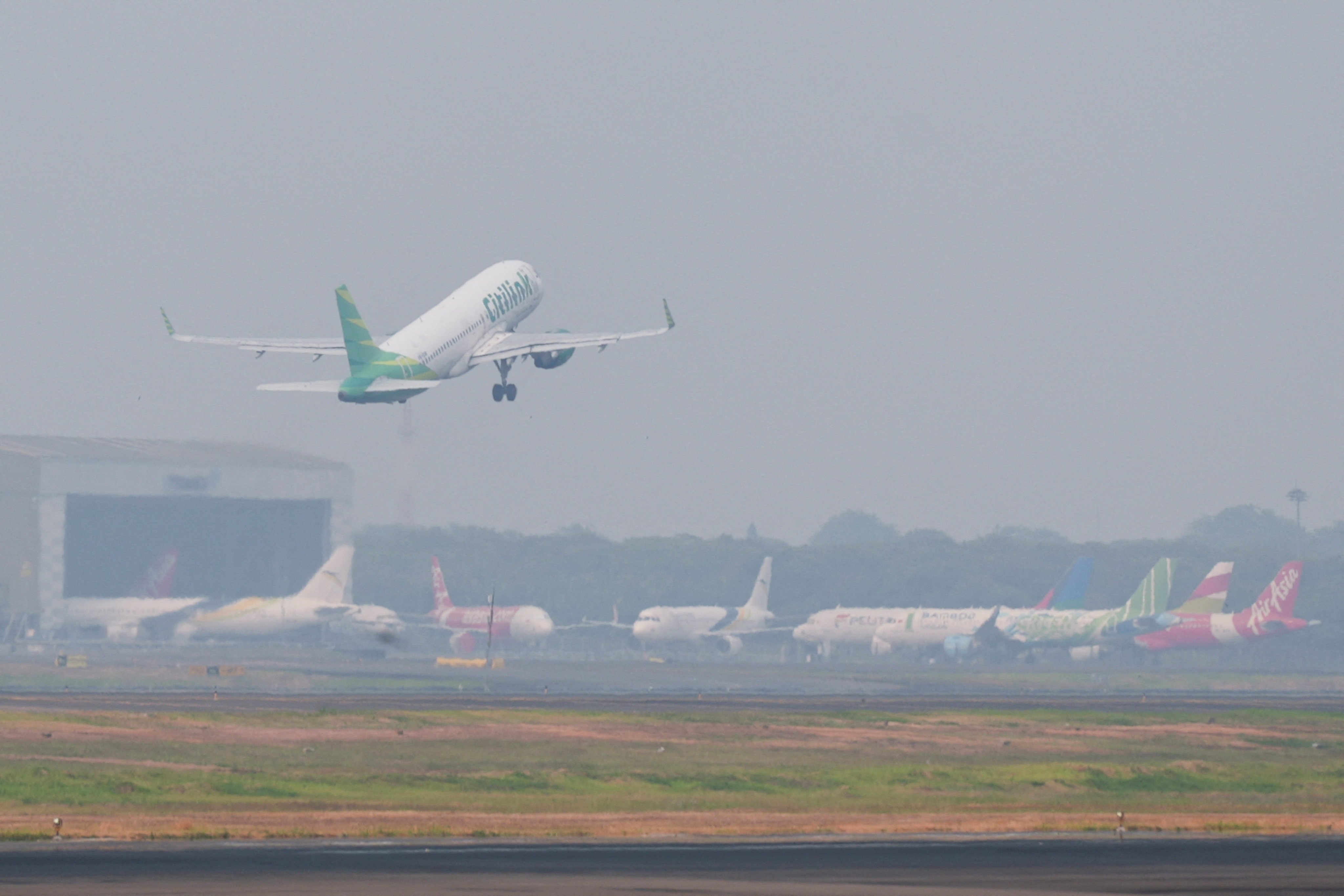A Citilink plane takes off from Soekarno-Hatta International Airport in Indonesia on Tuesday. Photo: Reuters