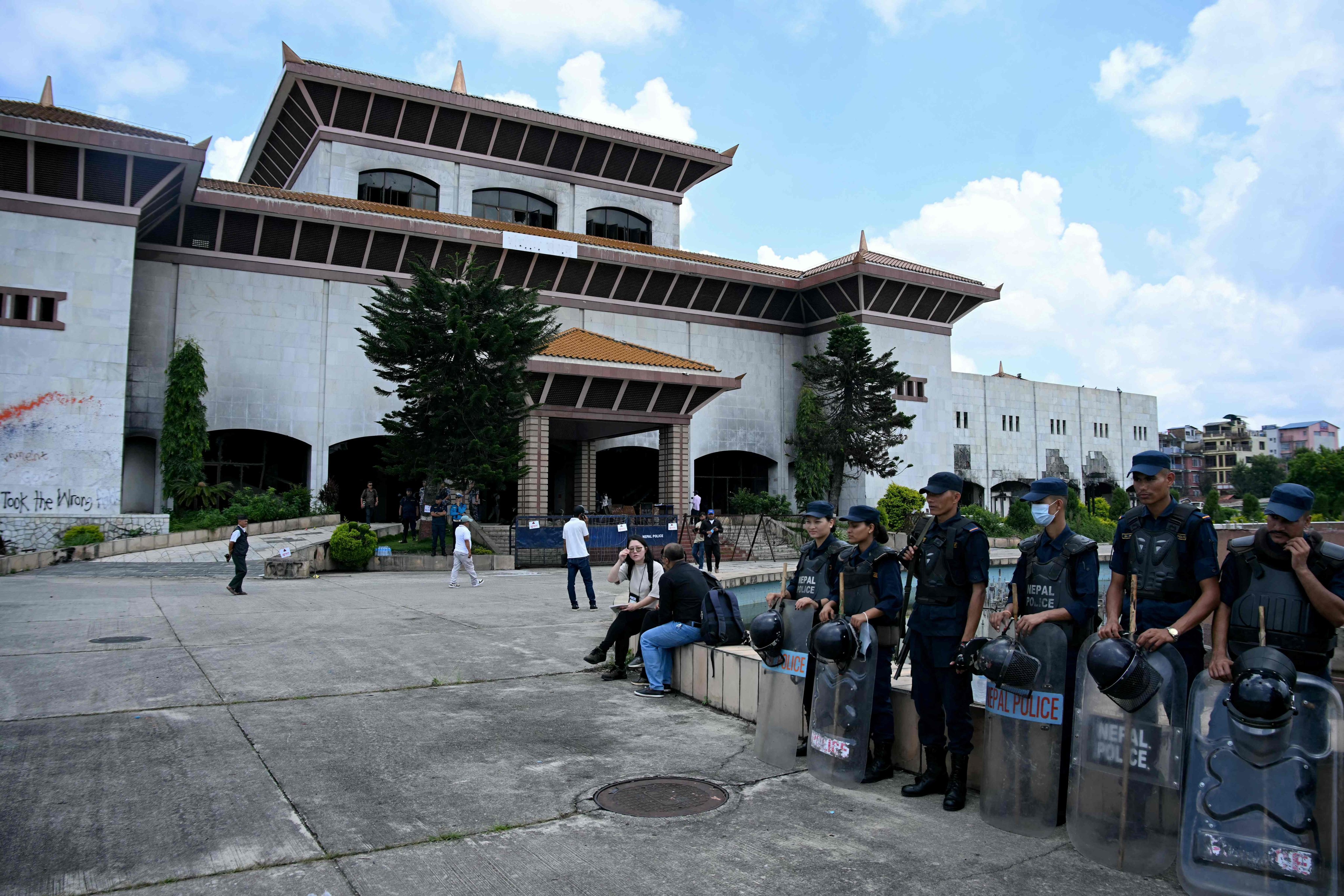 Police stand guard near the old parliament building in Kathmandu on Tuesday. Photo: AFP