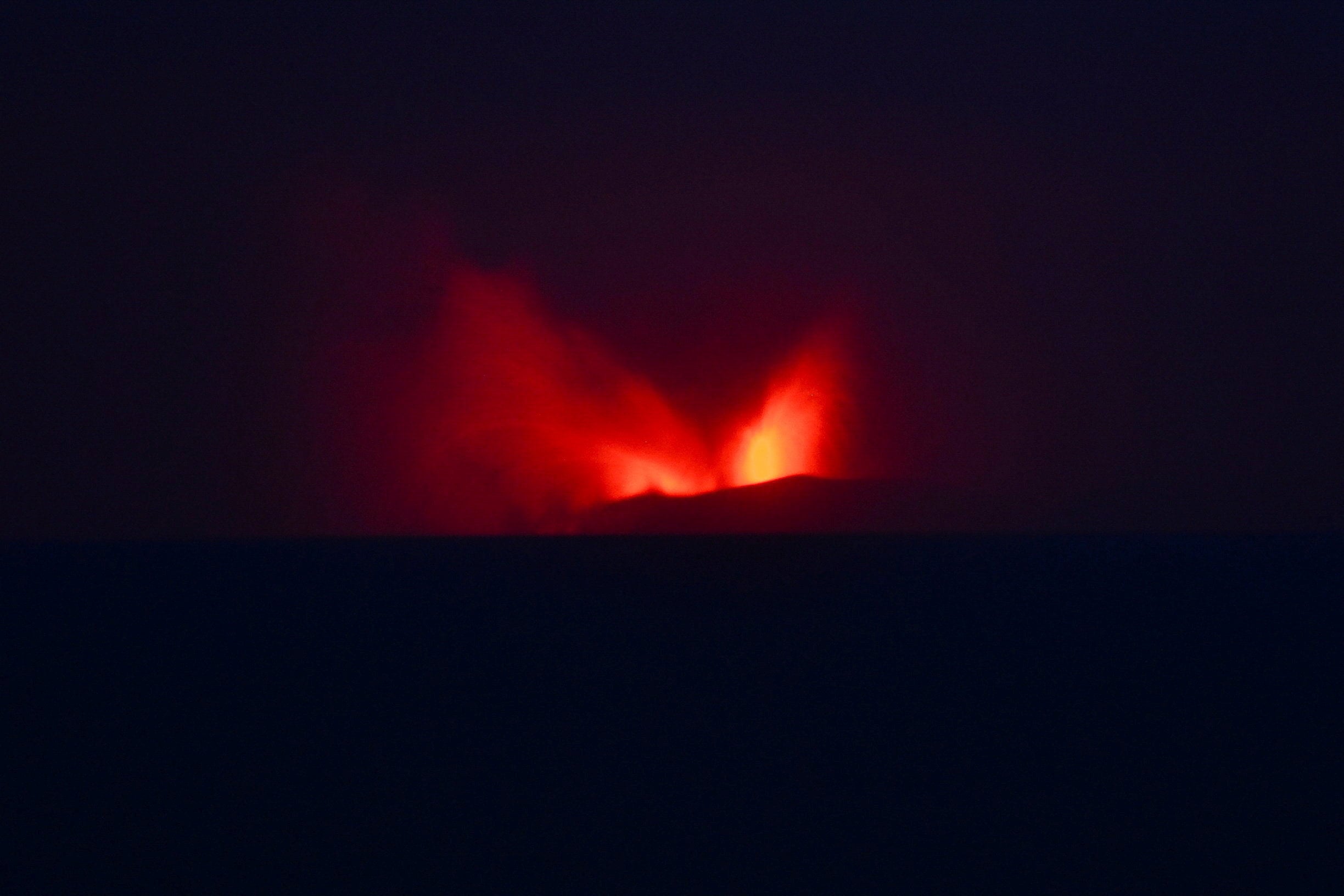 Mount Anak Krakatoa volcano spews hot lava as seen from Pasauran village in Serang, Indonesia’s Banten province, on Saturday. Photo: Reuters