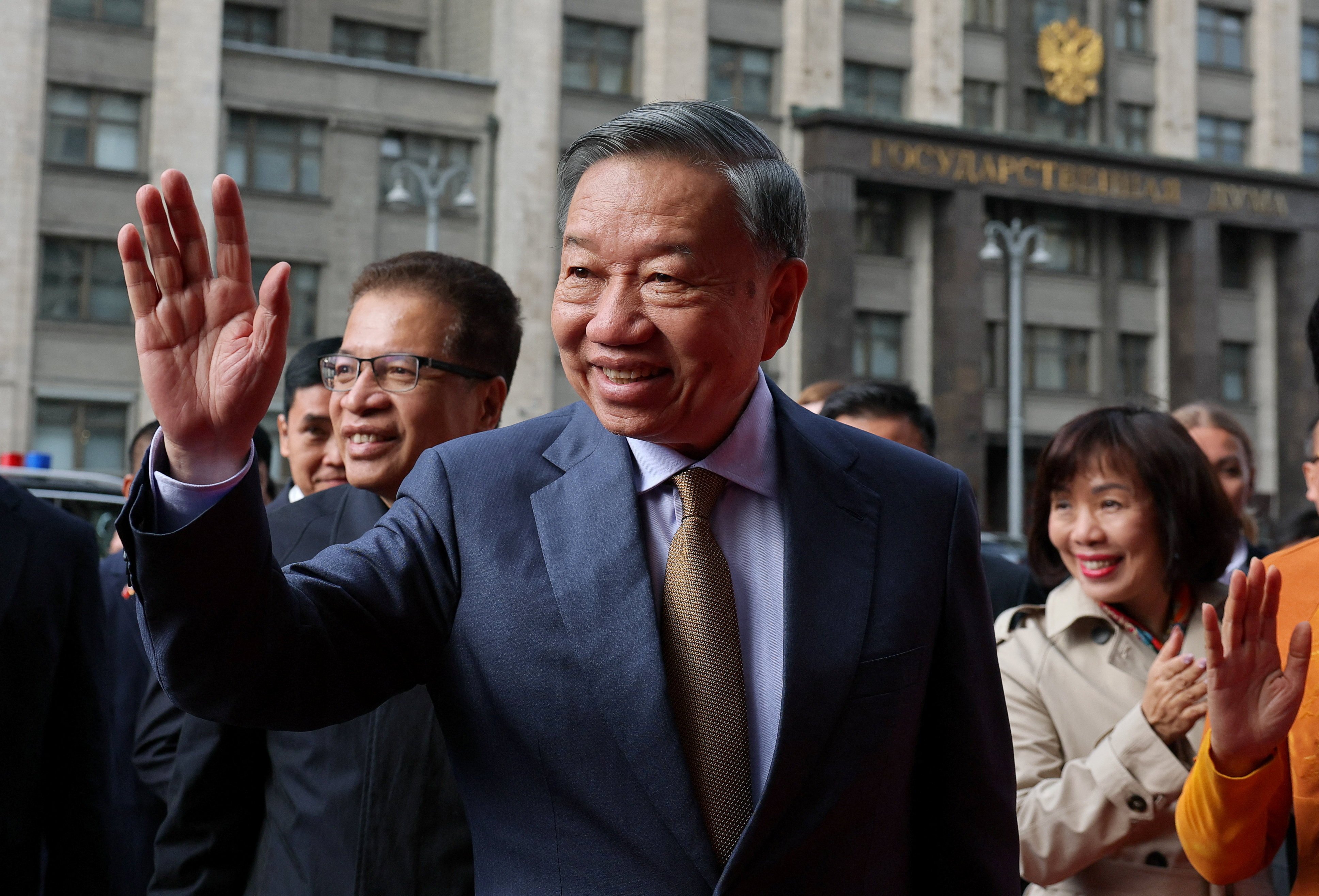 To Lam, Vietnam’s president and general secretary of its Communist Party, waves to members of a welcoming delegation in Moscow on Monday. Photo: Reuters