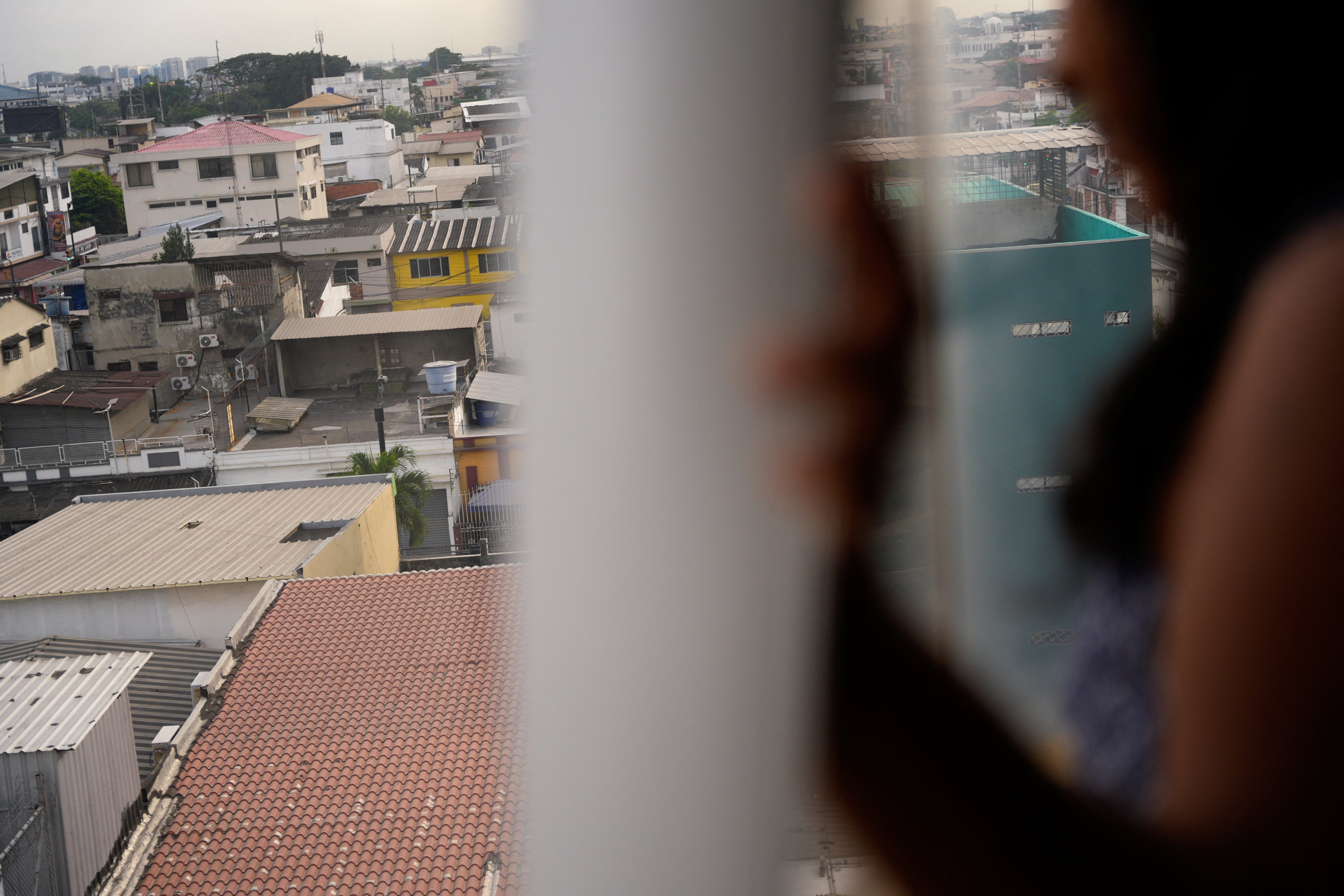 A woman displaced by gang violence poses for a photo during an interview in Guayaquil, Ecuador, in July. Photo: Reuters