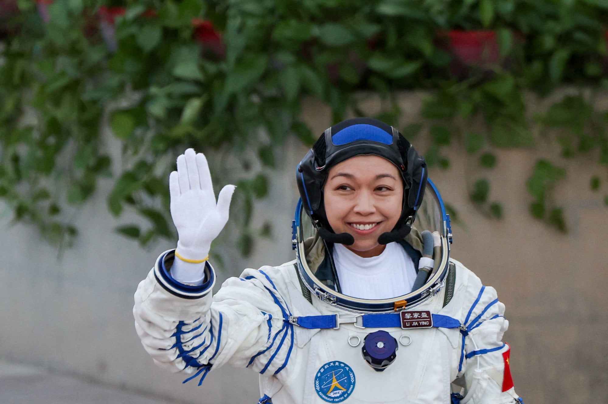 Lai Ka-ying waves during a see-off ceremony before the launch. Photo: Reuters