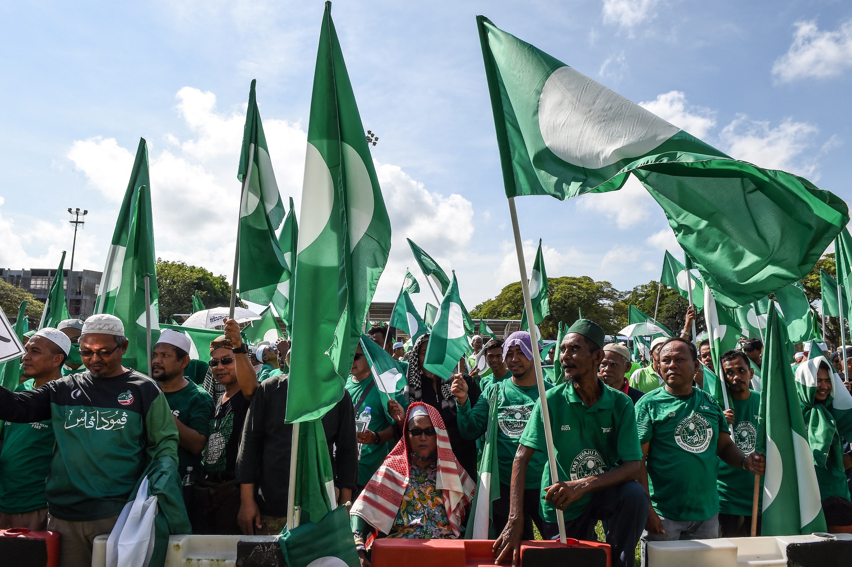 Supporters of Pan-Malaysian Islamic party (PAS) gather during the election nomination day in Pekan ahead of Malaysia’s 2018 general election. Photo: AFP