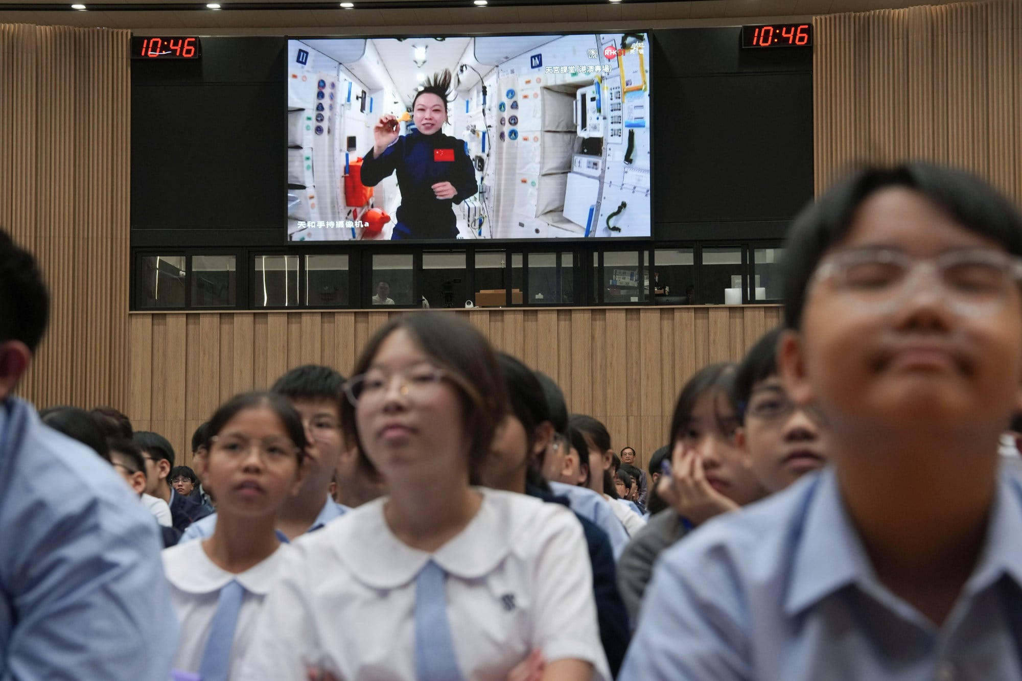 Students watch the live lecture by astronaut Lai Ka-ying. Photo: Sam Tsang