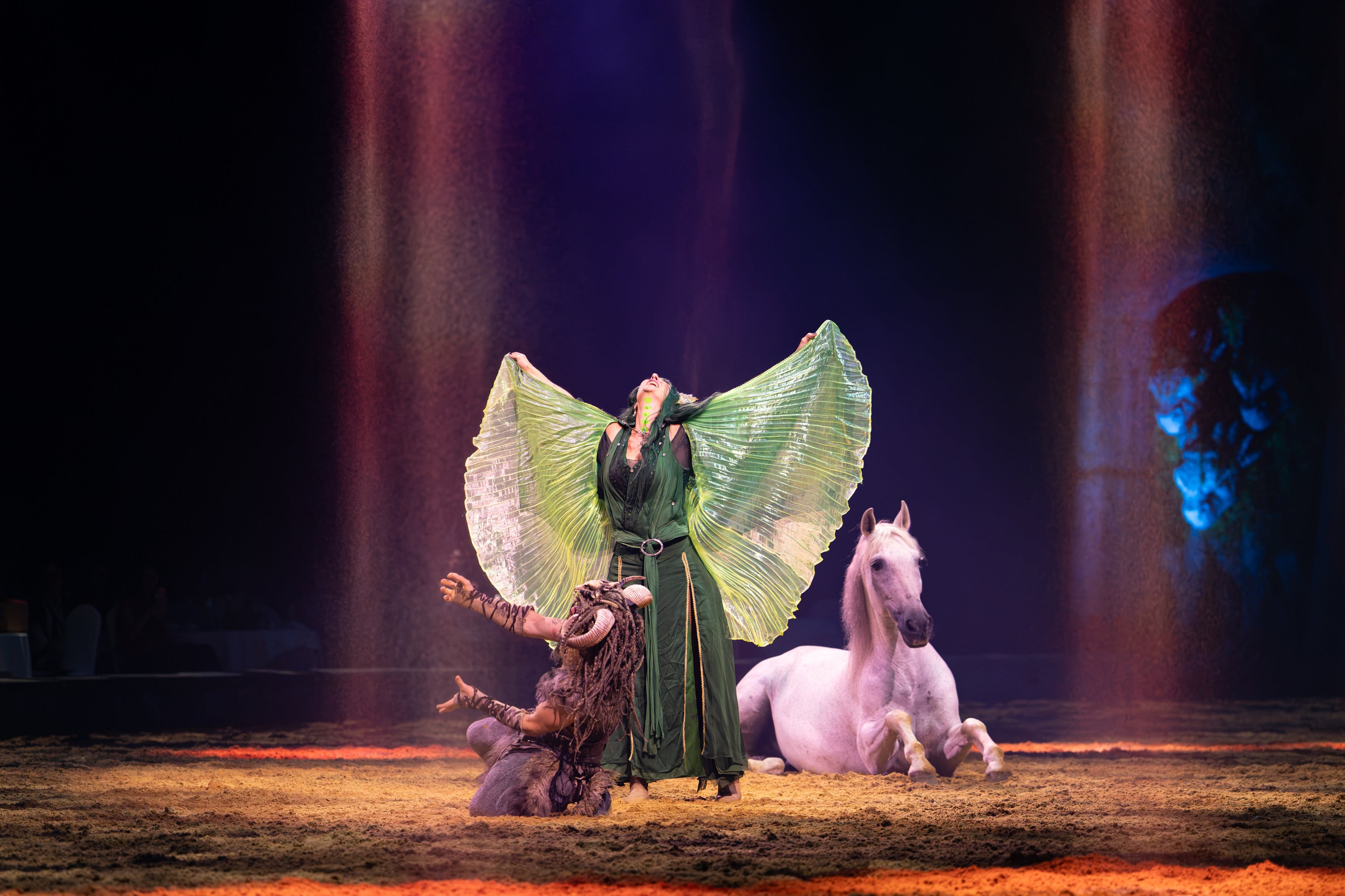 One of the stars and her white horse in Cavalluna – Gate to the Otherworld. Photo: Cavalluna