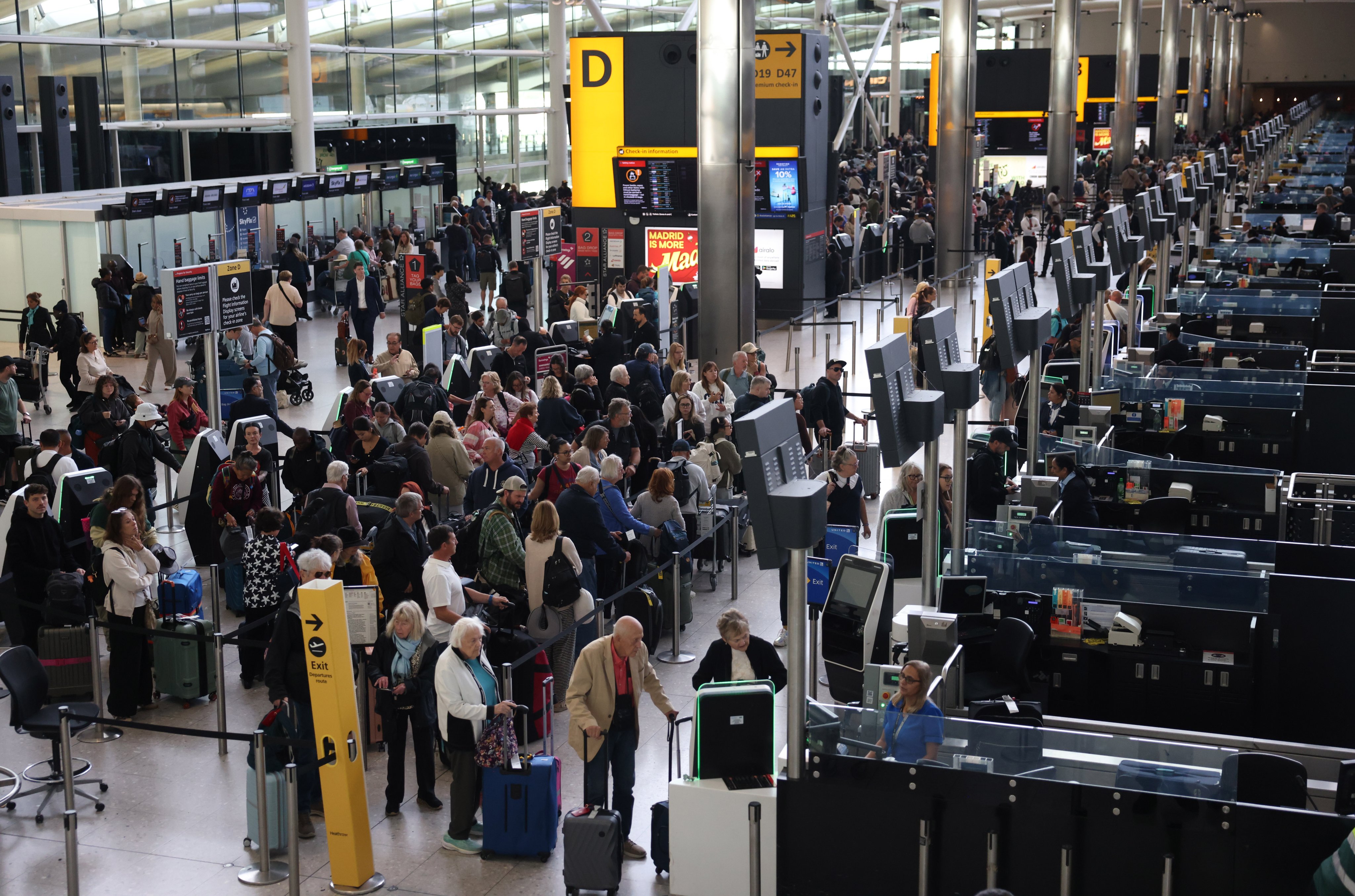 Passengers wait at a departure lounge at a terminal in Heathrow Airport, Britain, on Wednesday. Photo: EPA