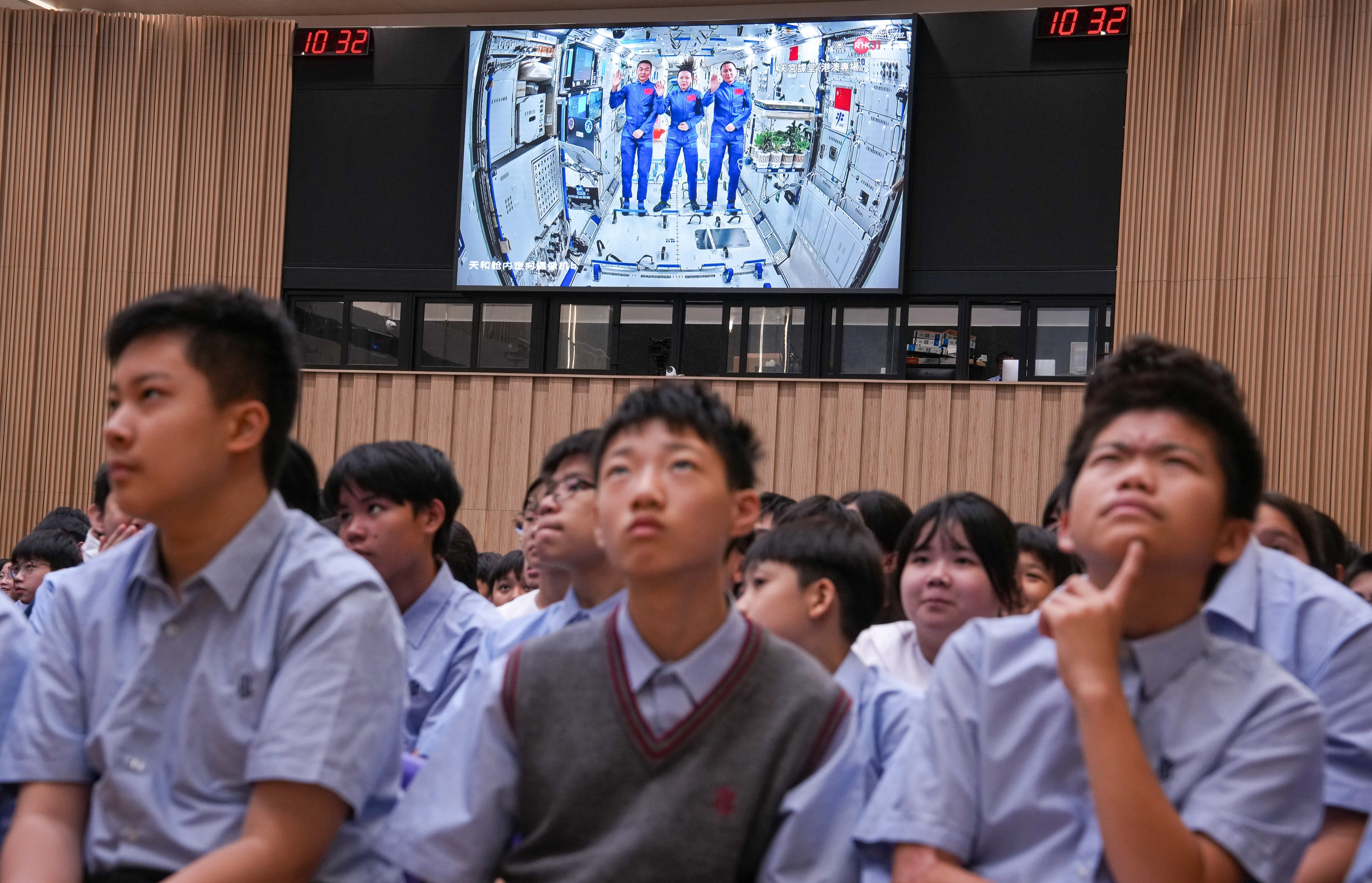 Students of Scientia Secondary School in Ho Man Tin watch the “Tiangong lesson”, conducted by Lai Ka-ying and her crewmates at the Chinese space station on Wednesday. Photo: Sam Tsang
