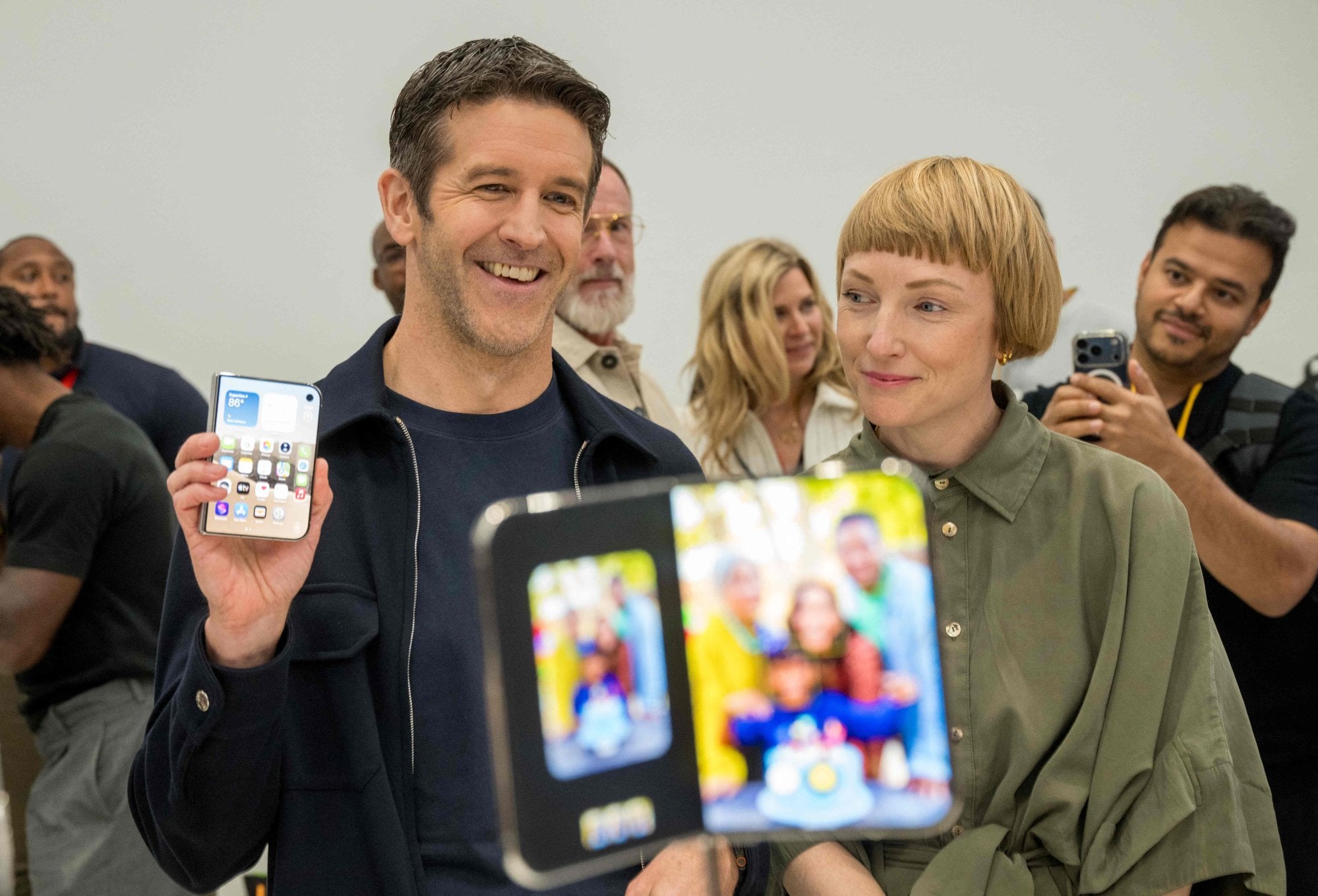 Apple CEO John Ternus, alongside vice-president of industrial design Molly Anderson, with the new iPhone Duo in California on Wednesday. Photo: AFP