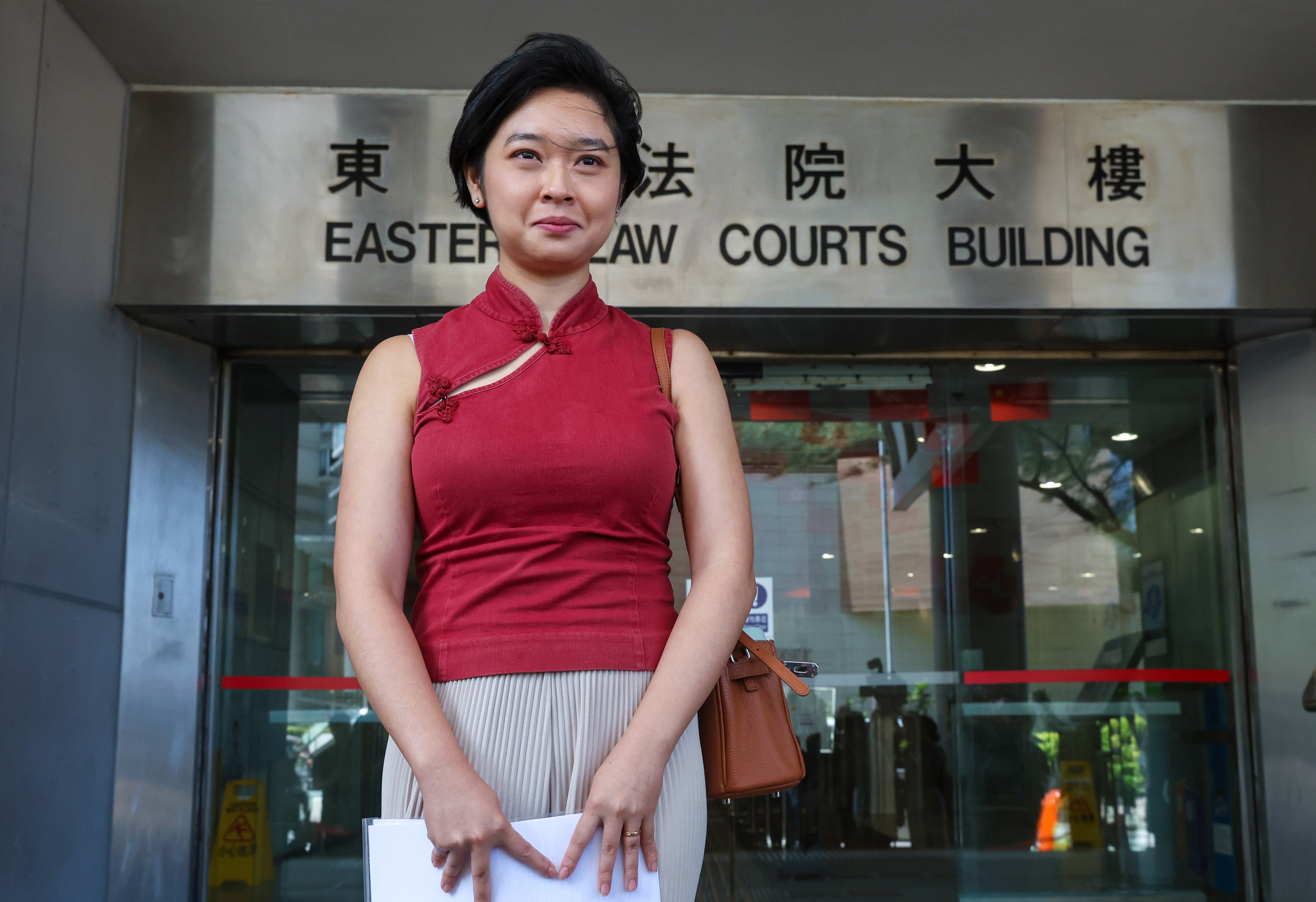 Hong Kong Journalists Association chairwoman Selina Cheng speaks to media outside the Eastern Court building after the ruling. Photo: Edmond So