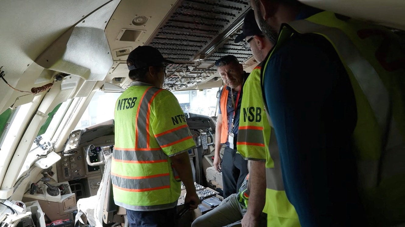 Investigators inspect the cockpit. Photo: NTSB via Reuters