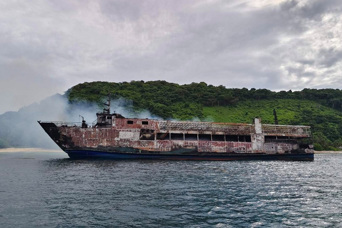 Remains of the ferry MV June Aster that caught fire off Palawan province, western Philippines, on Thursday. Photo: Philippine Coast Guard via AP