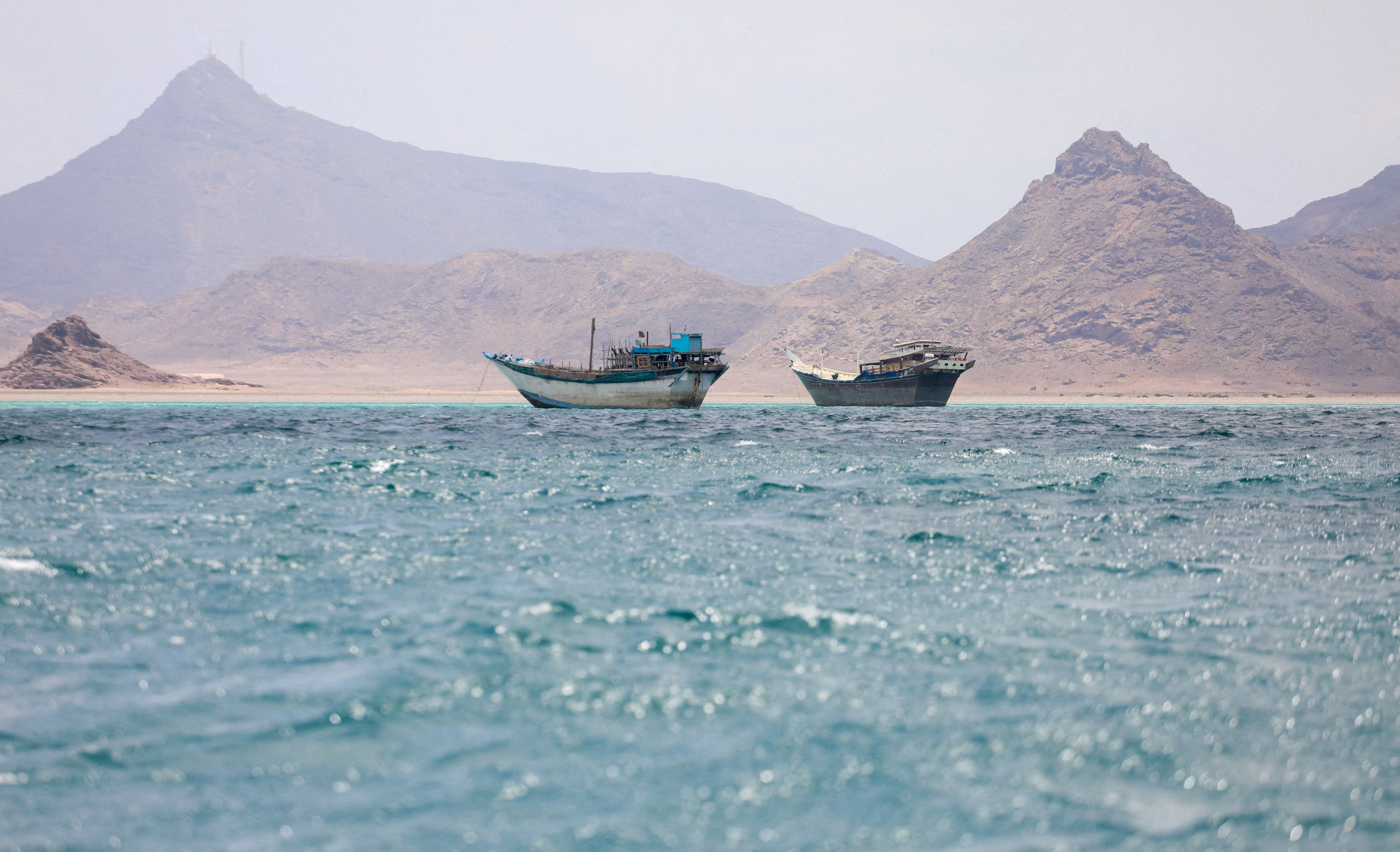 Boats float near the coast of Bab el-Mandeb, Yemen, in April. Photo: Reuters