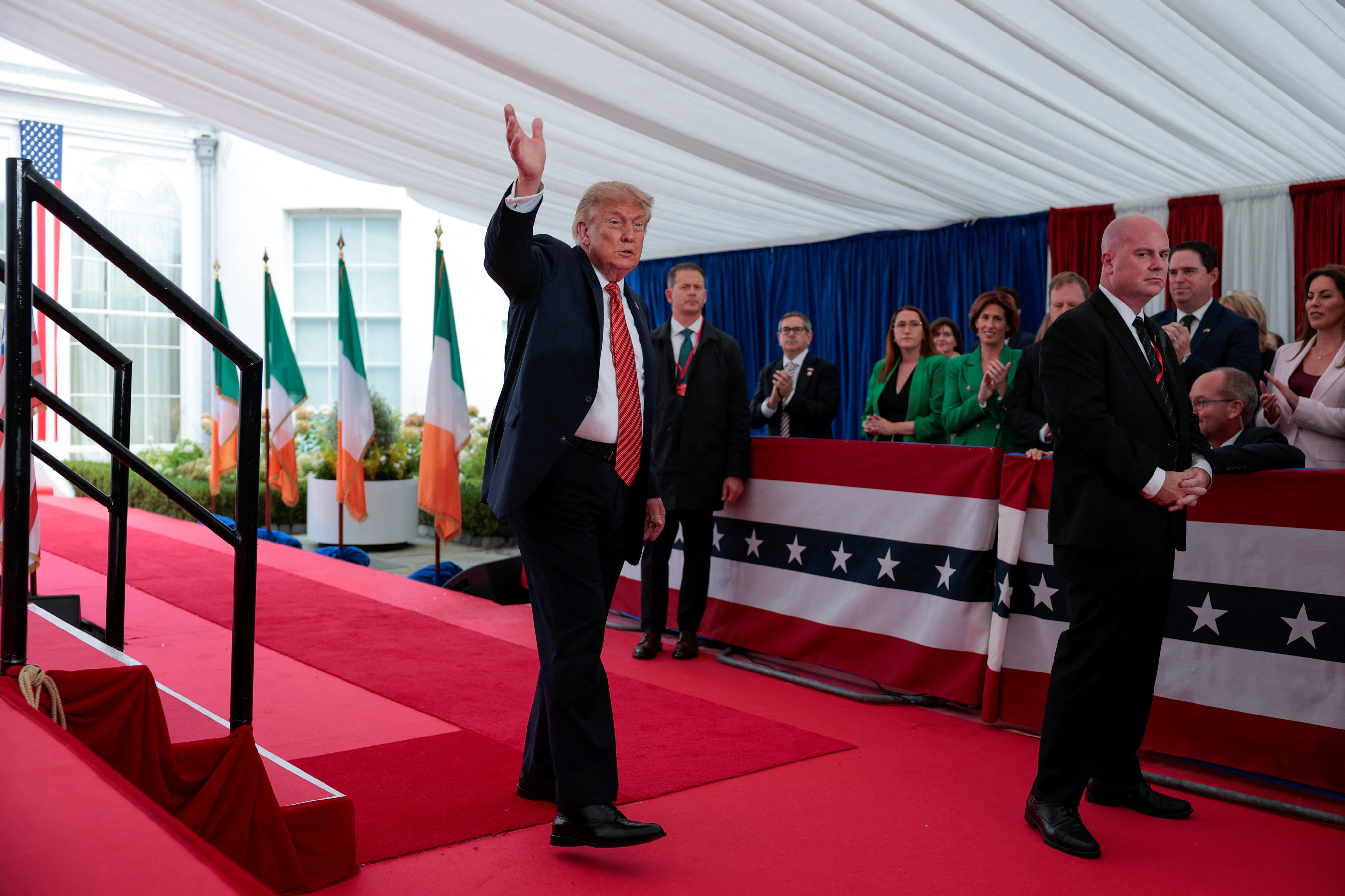 US President Donald Trump waves after delivering remarks to US embassy personnel and business leaders at Deerfield Residence, the residence of the US Ambassador to Ireland, in Dublin, on Saturday. Photo: Reuters