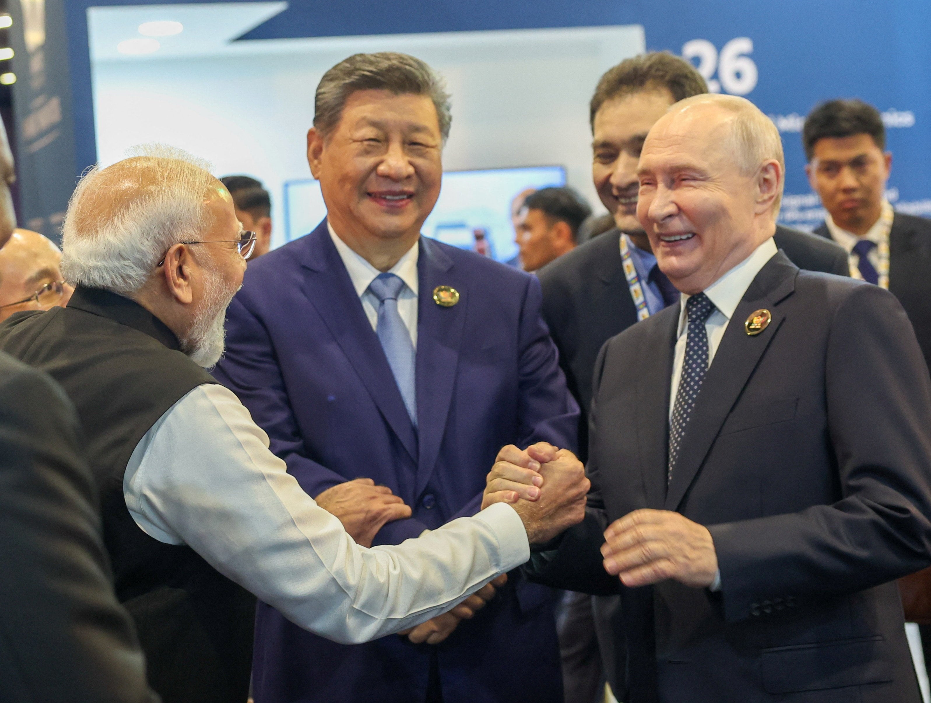 Indian Prime Minister Narendra Modi, Russian President Vladimir Putin and Chinese President Xi Jinping share a moment at Bharat Mandapam during the Brics summit in New Delhi, India, on Saturday. Photo: Handout via Reuters