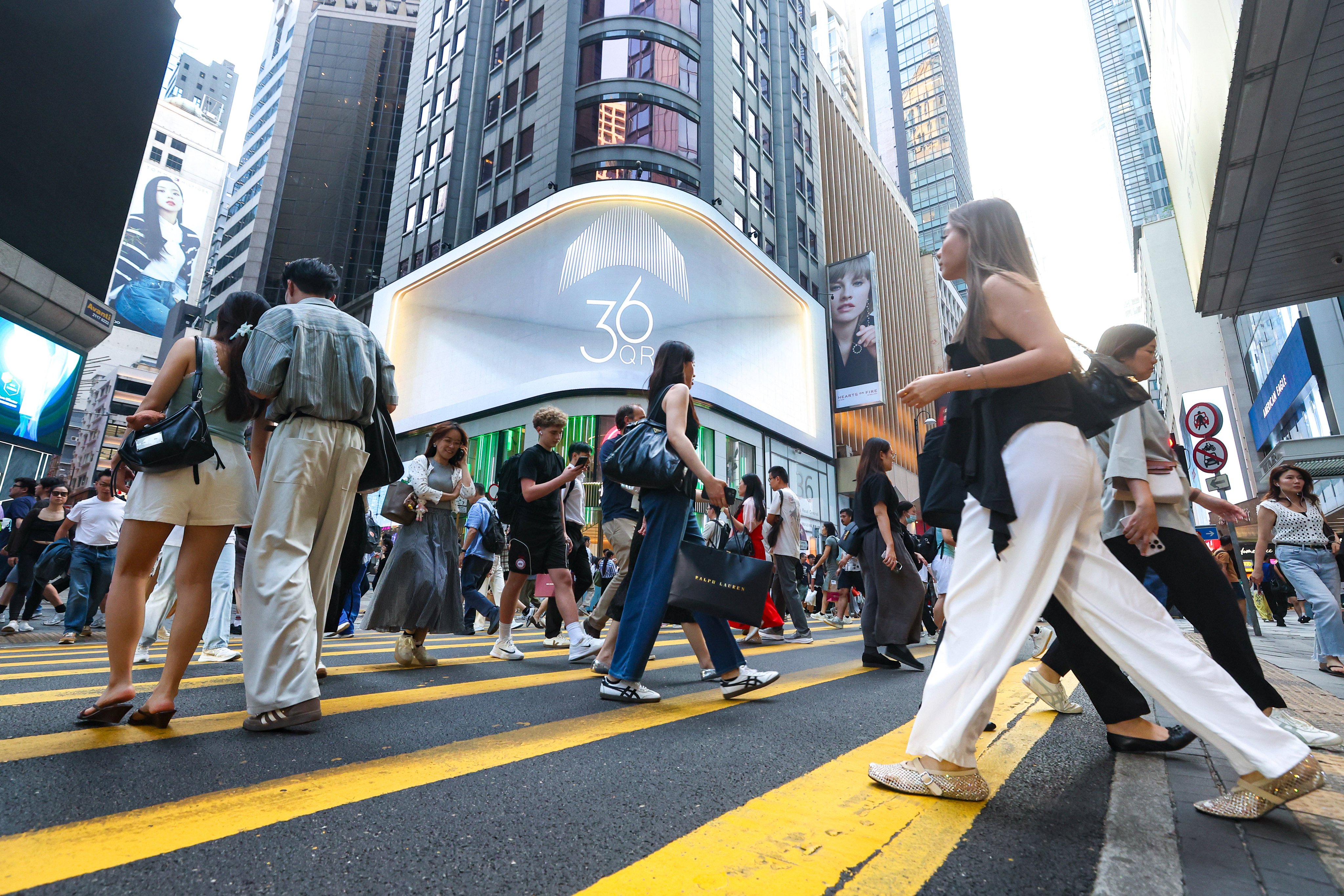 John Lee says Hong Kong’s first five-year blueprint will not alter the city’s capitalist system. Photo: Edmond So