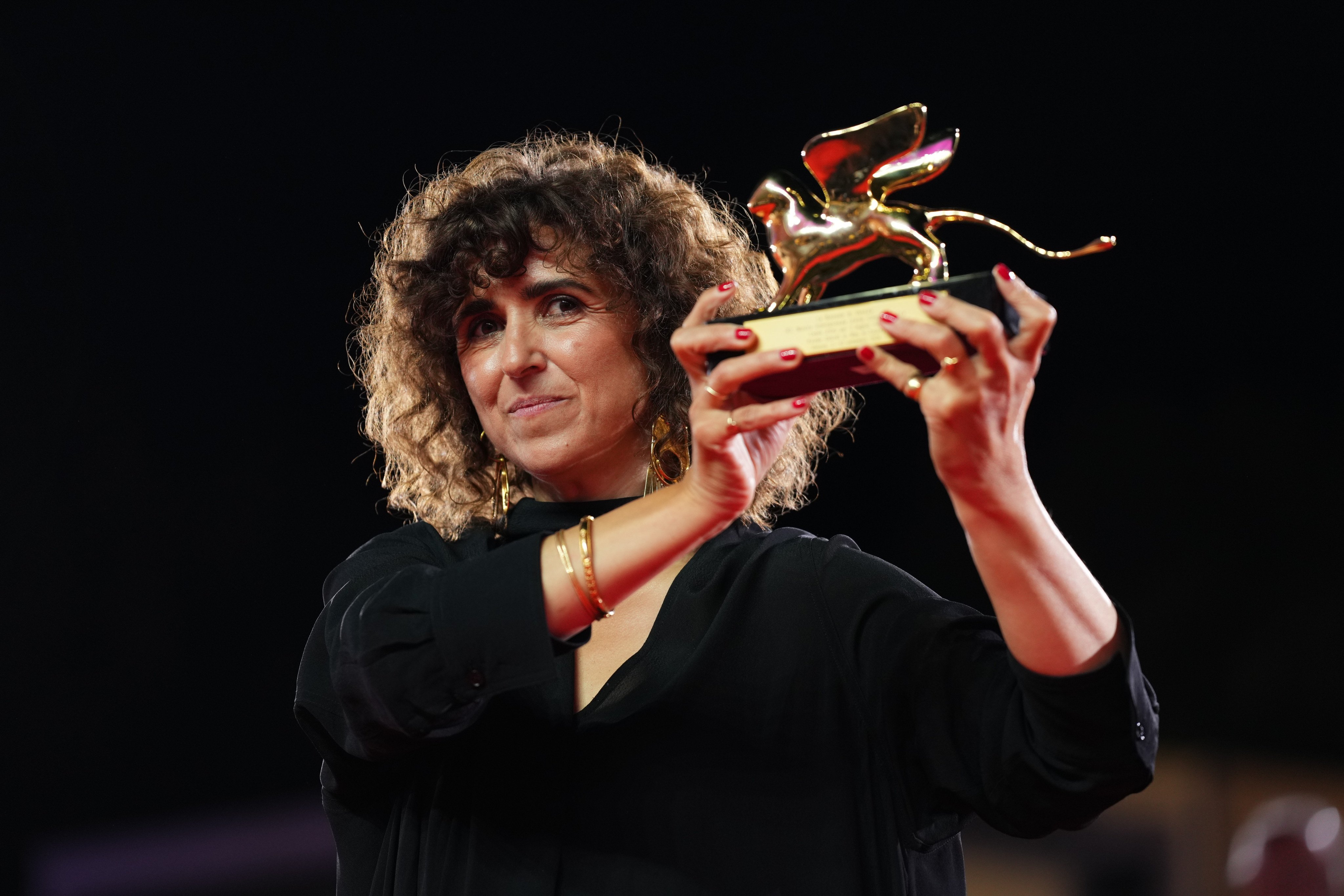 Director May el-Toukhy holds the Golden Lion she won for best film for “Woman Unknown” during the closing ceremony of the 83rd edition of the Venice Film Festival in Venice, Italy, on Saturday. Photo: Invision/AP