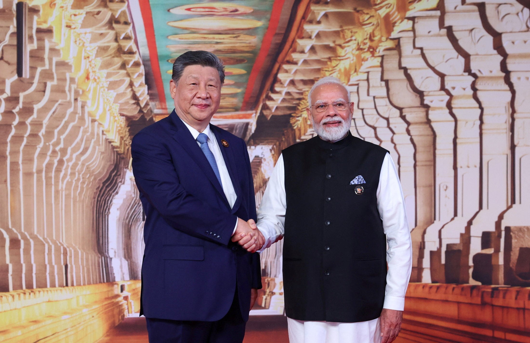 Chinese President Xi Jinping with Indian  Prime Minister Narendra Modi at the Brics summit venue in New Delhi on Saturday. Photo: via Reuters
